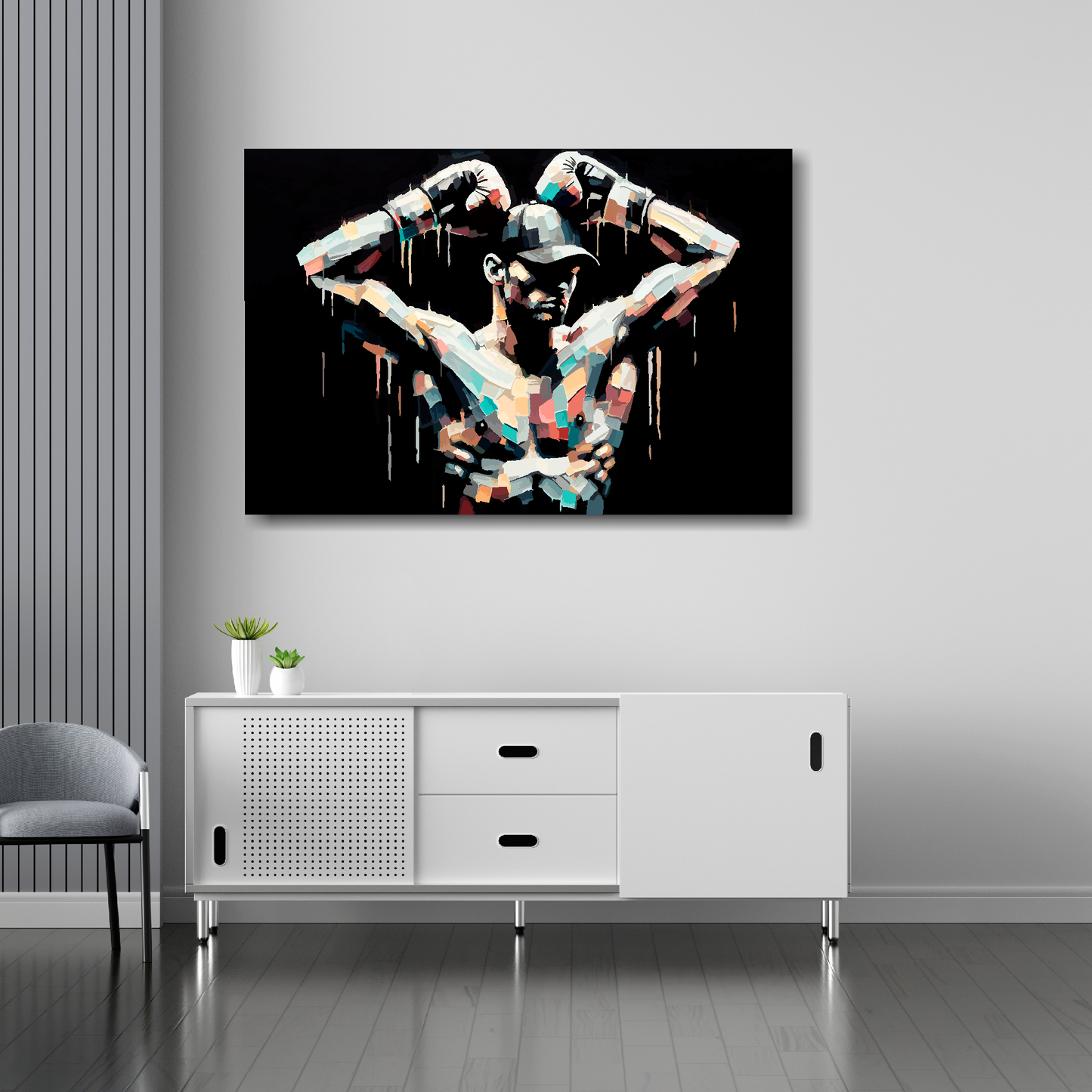 36 inch by 24 inch abstract canvas print of a colourful boxer. Mounted on a white wall above a white sideboard.