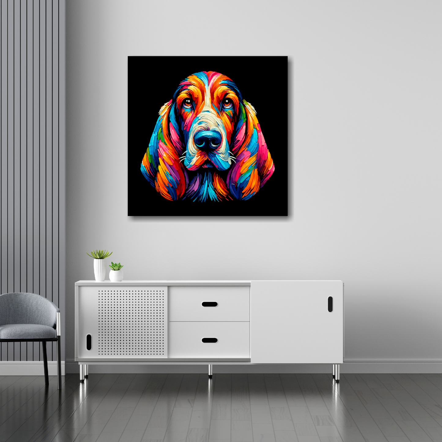 30 inch by 30 inch square canvas of a colourful Basset Hound head portrait on a black background. Mounted on a white wall above a white sideboard.