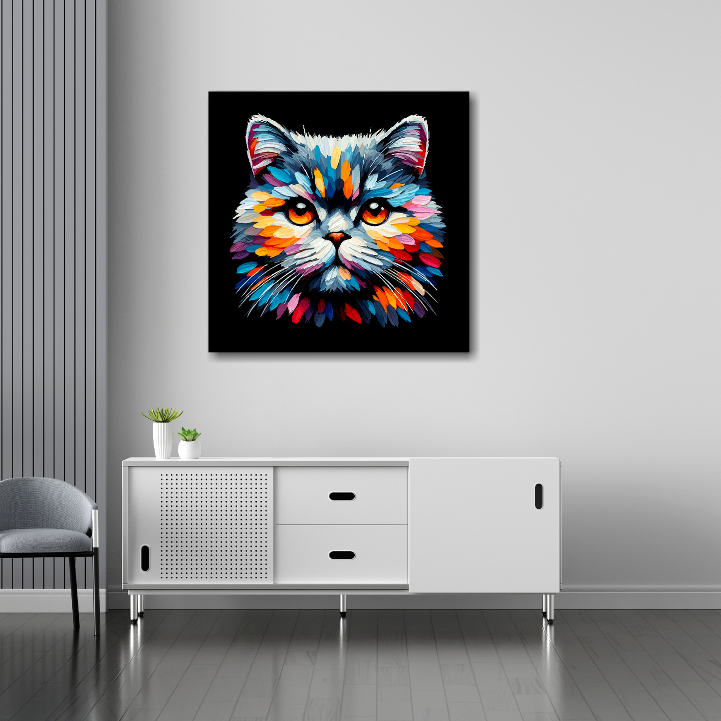 30 inch by 30 inch square canvas of a colourful British shorthair cat head portrait on a black background. Mounted on a white wall above a white sideboard.