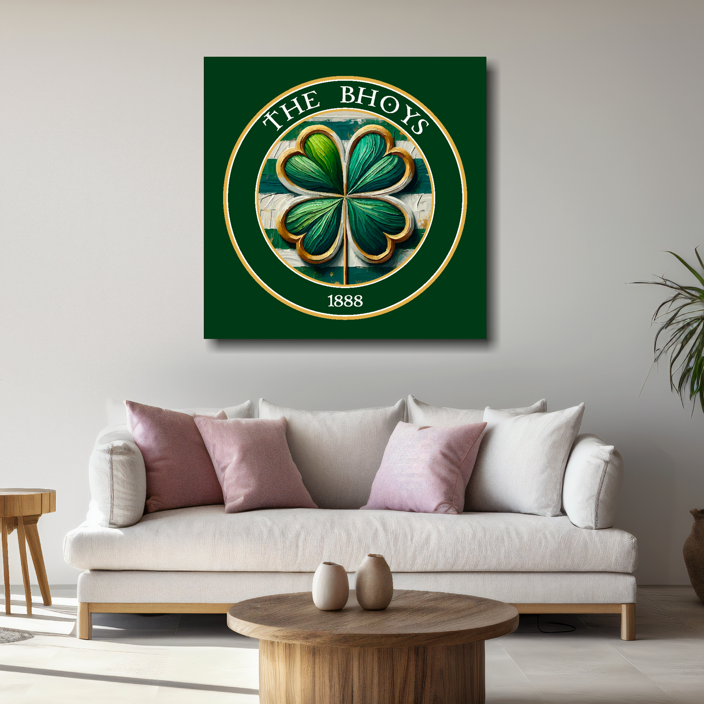Decorative wall art with a four-leaf clover design and 'The Bhoys' text on a green background, displayed above a living room sofa.