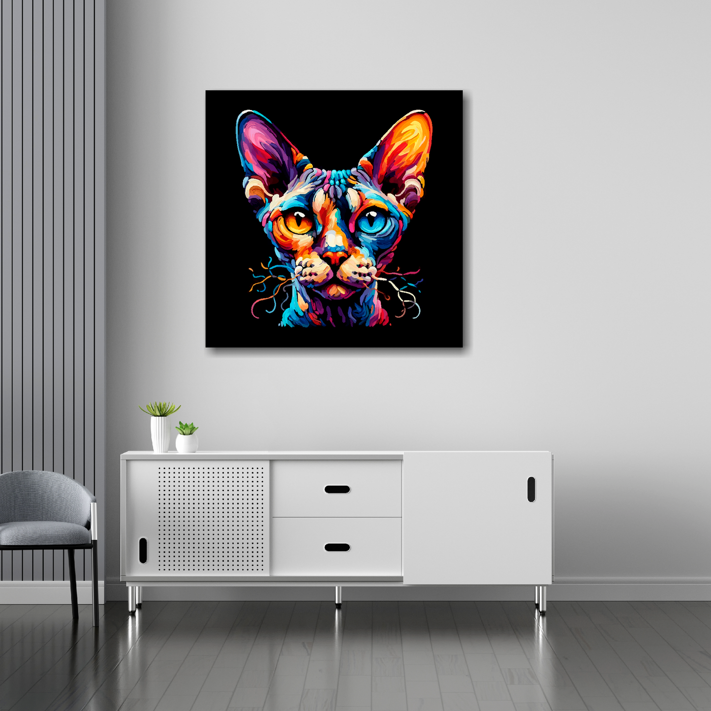 30 inch by 30 inch square canvas of a colourful Devon Rex cat head portrait on a black background. Mounted on a white wall above a white sideboard.