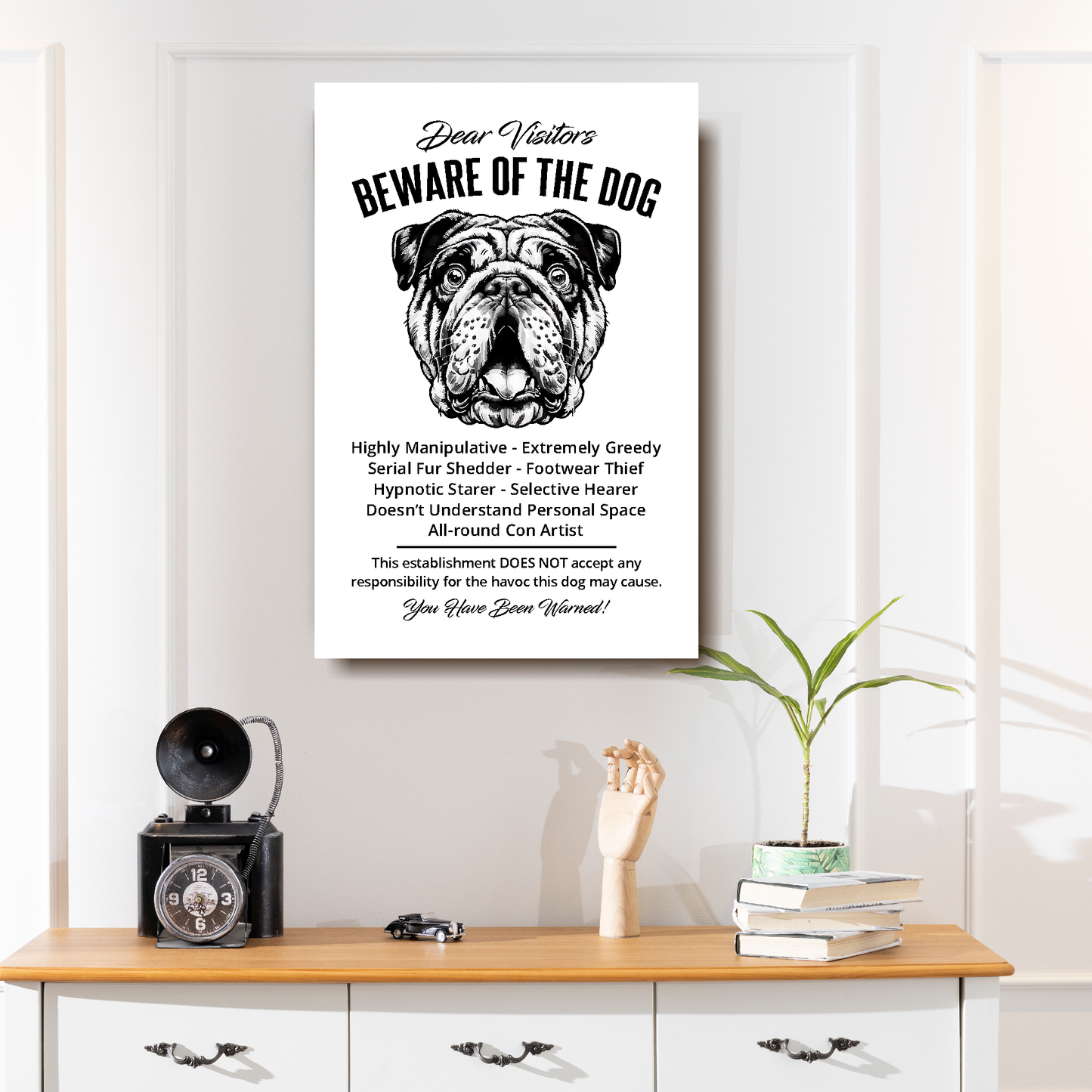 A funny Bulldog 'Beware of the Dog' disclaimer notice. Black text and dog image on a white background. Available in 4 Canvas sizes. A great gift for dog owners.
