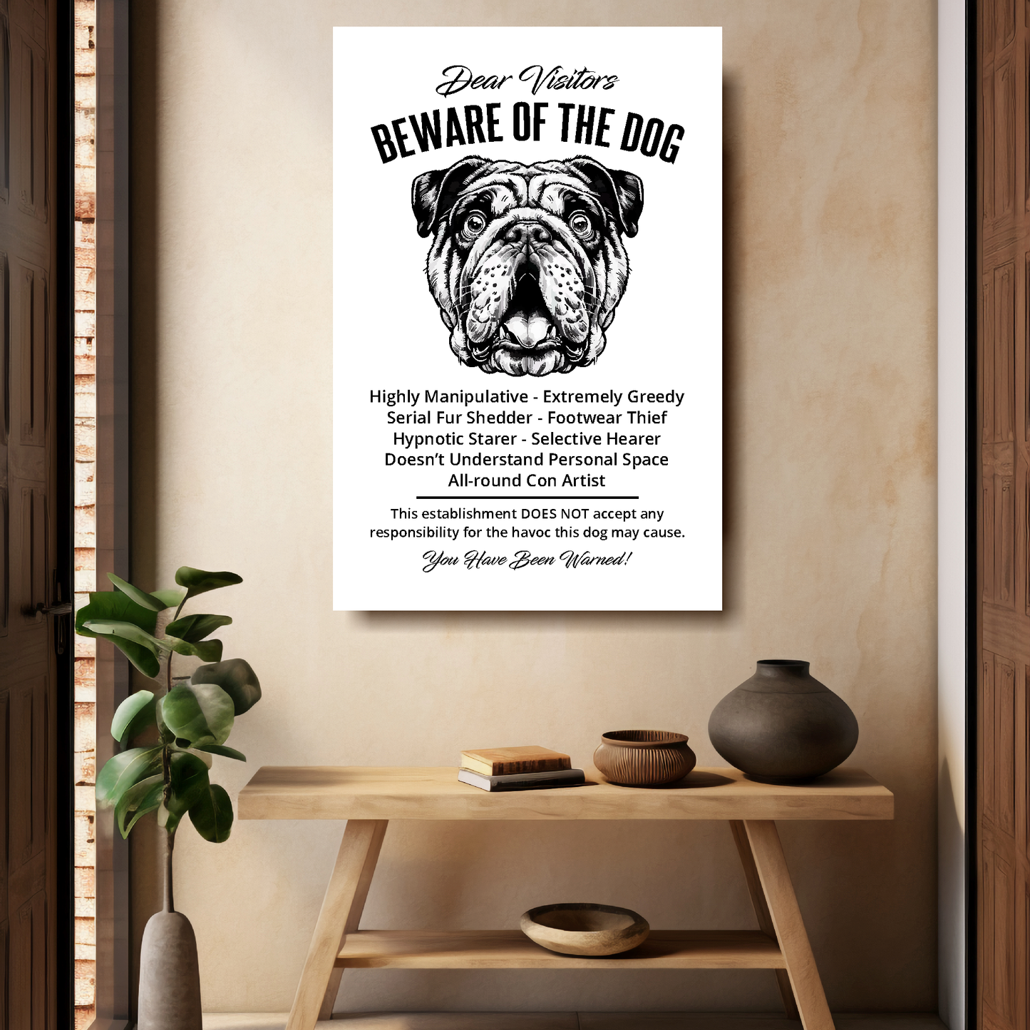 A funny Bulldog 'Beware of the Dog' disclaimer notice. Black text and dog image on a white background. Available in 4 Canvas sizes. A great gift for dog owners.
