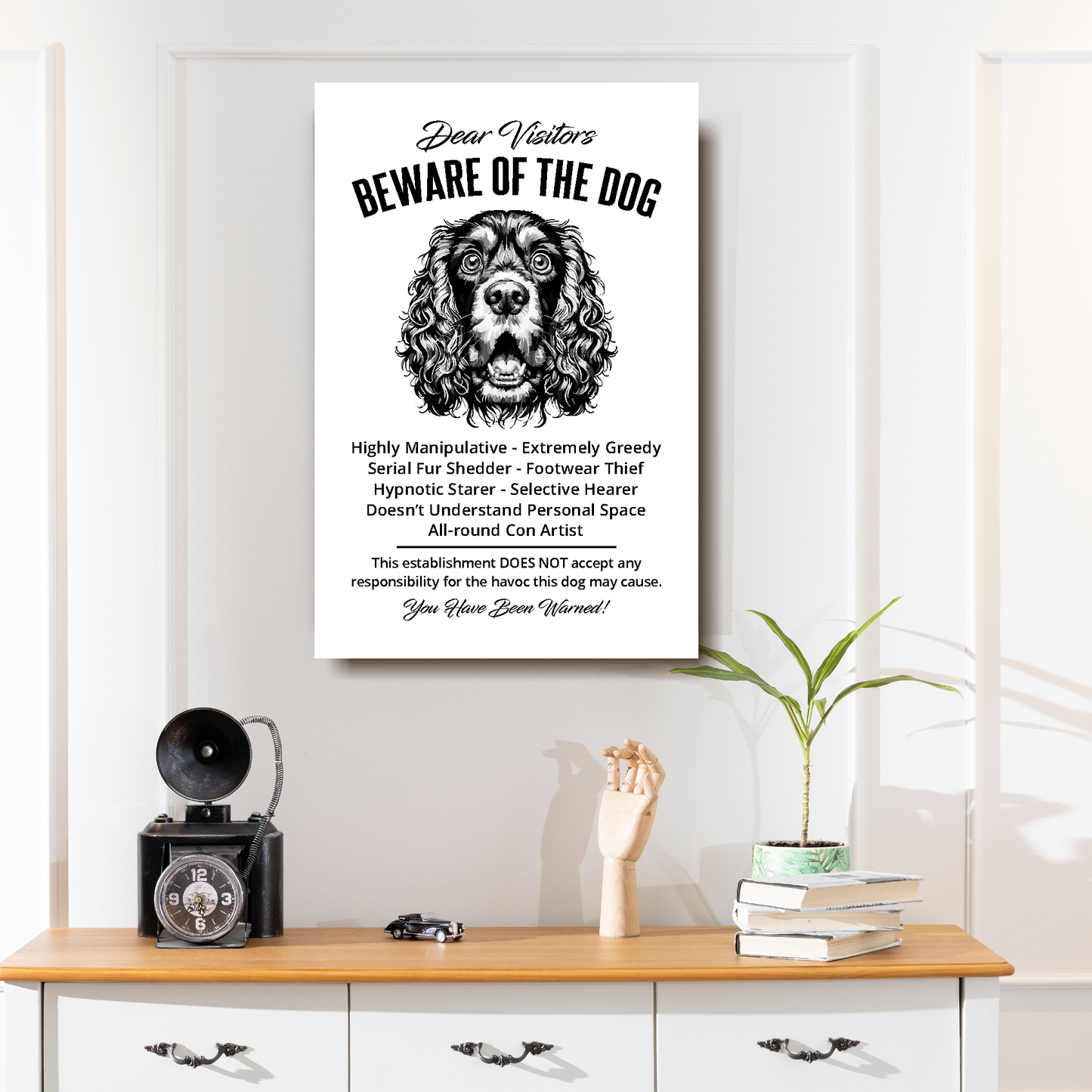 A funny Cocker Spaniel 'Beware of the Dog' disclaimer notice. Black text and dog image on a white background. Available in 4 Canvas sizes. A great gift for dog owners.