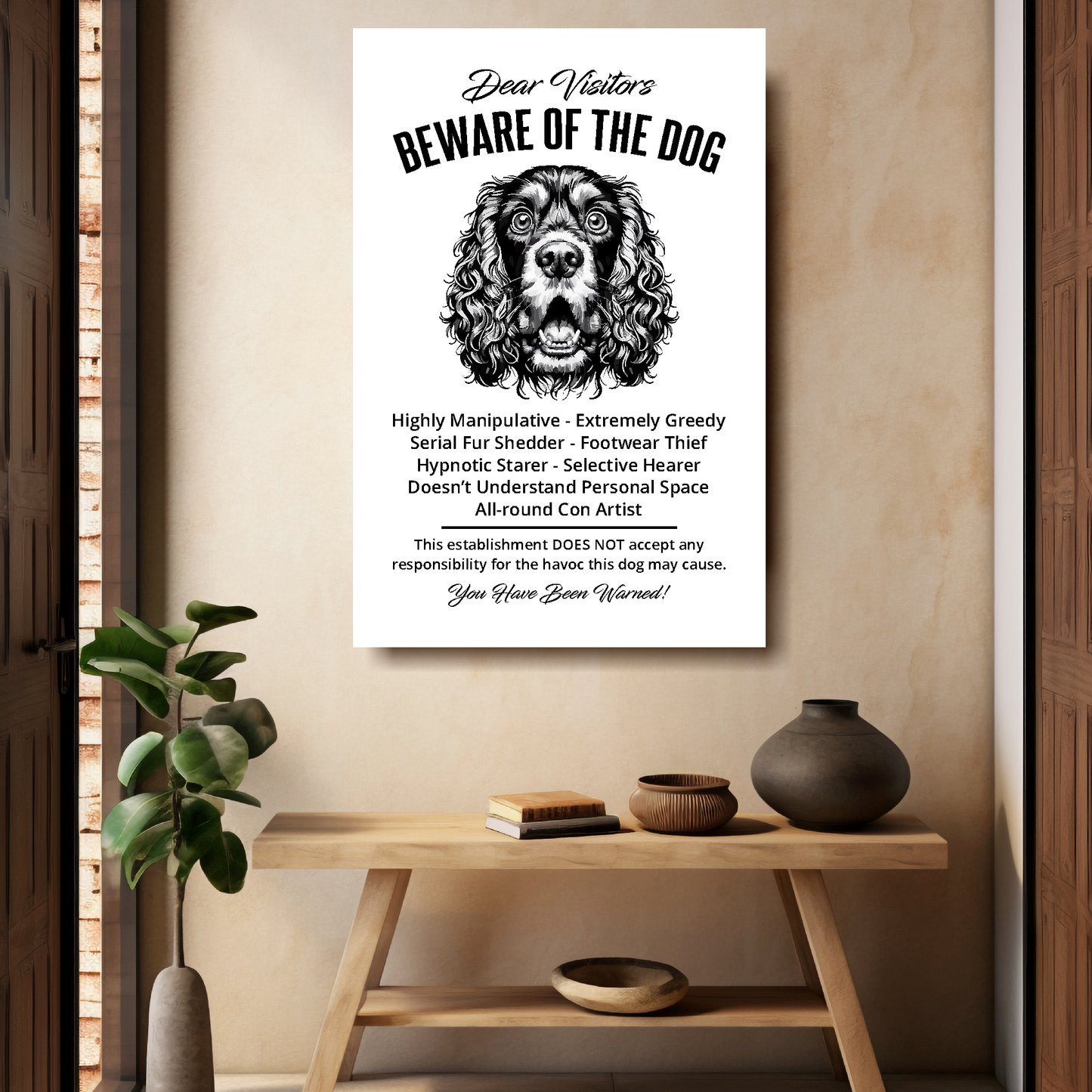 A funny Cocker Spaniel 'Beware of the Dog' disclaimer notice. Black text and dog image on a white background. Available in 4 Canvas sizes. A great gift for dog owners.