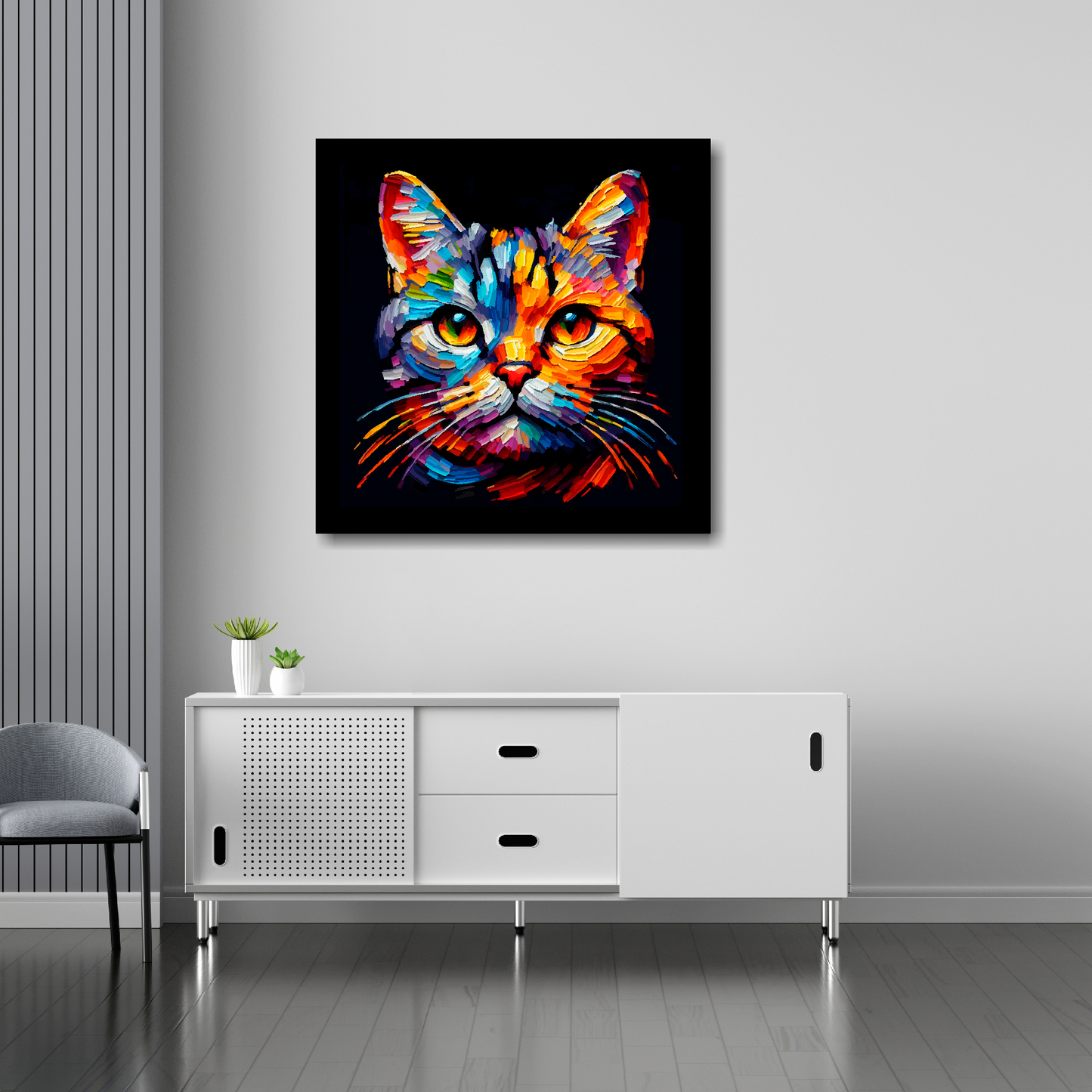 30 inch by 30 inch square canvas of a colourful European Shorthair cat head portrait on a black background. Mounted on a white wall above a white sideboard.