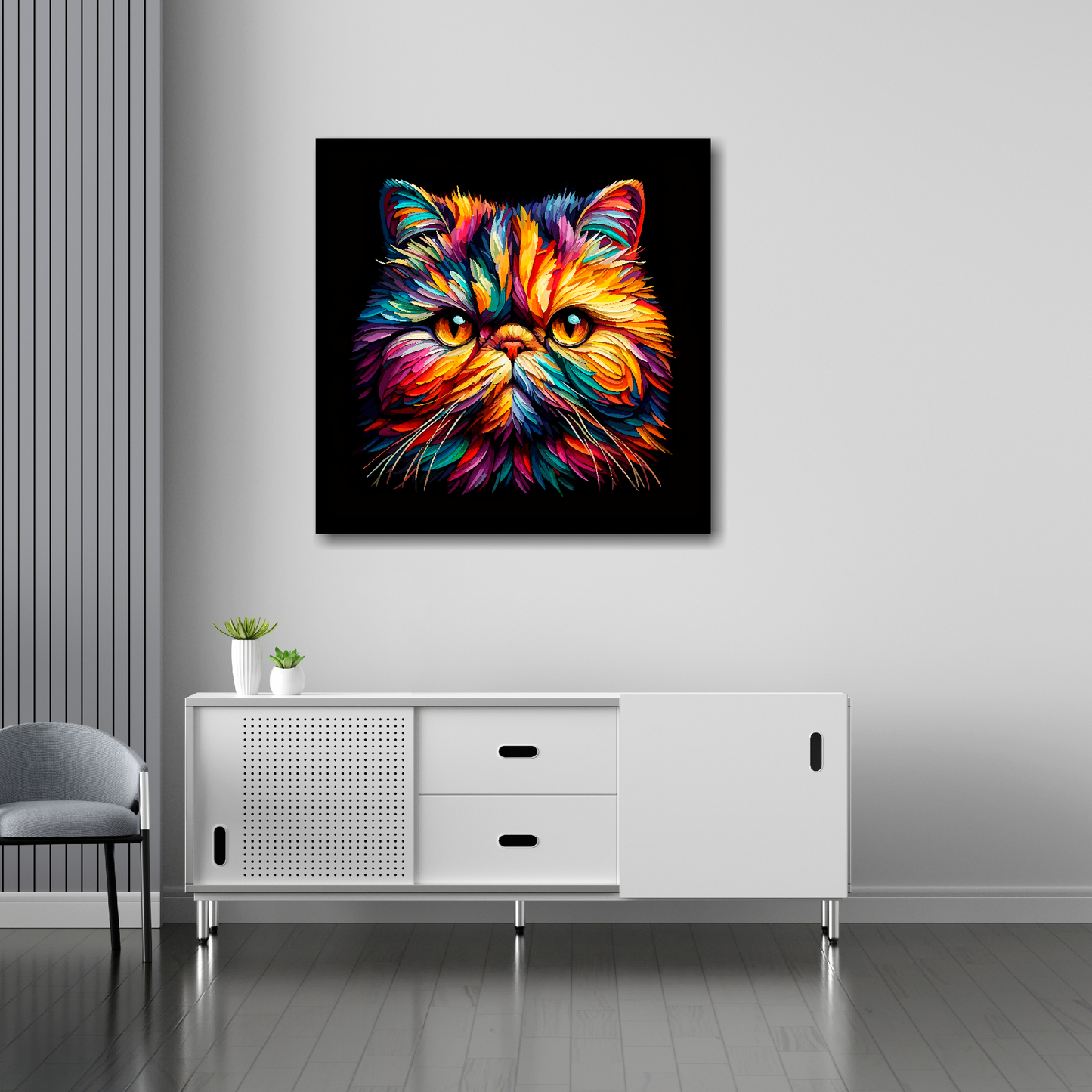 30 inch by 30 inch square canvas of a colourful Exotic Shorthair cat head portrait on a black background. Mounted on a white wall above a white sideboard.