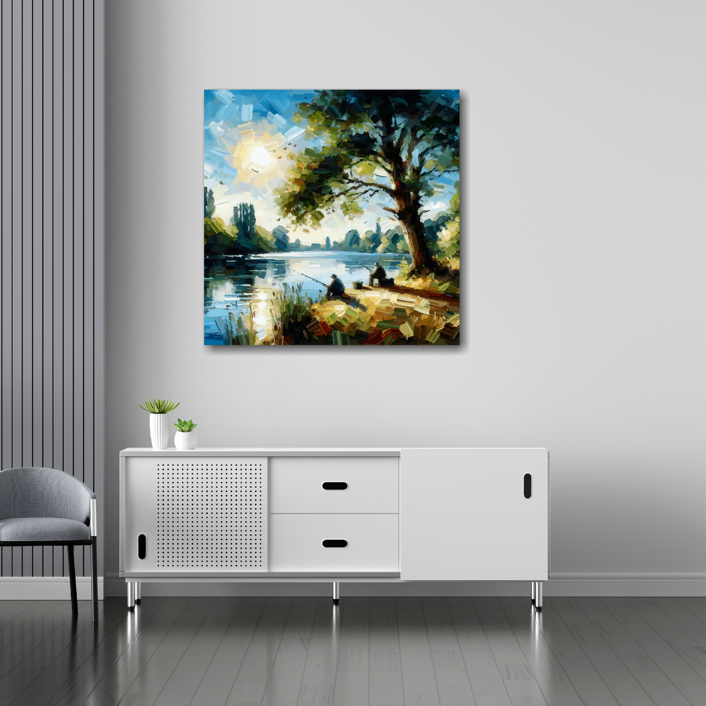 30 inch by 30 inch square canvas featuring two anglers beside a traquil lake. Mounted on a white wall above a white sideboard.