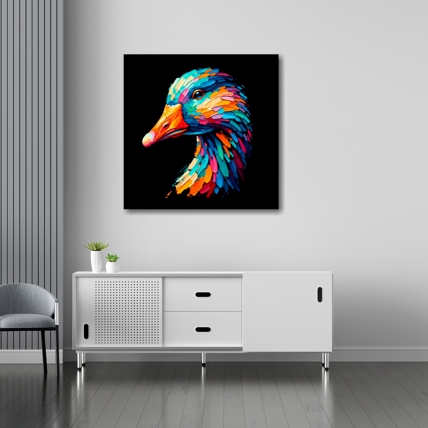 30 inch by 30 inch square canvas of a colourful Goose portrait on a black background. Mounted on a white wall above a white sideboard.