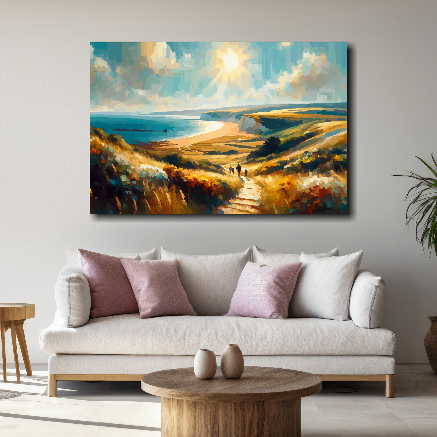 Large canvas of a coastal landscape above a white sofa with decorative pillows in a living room.