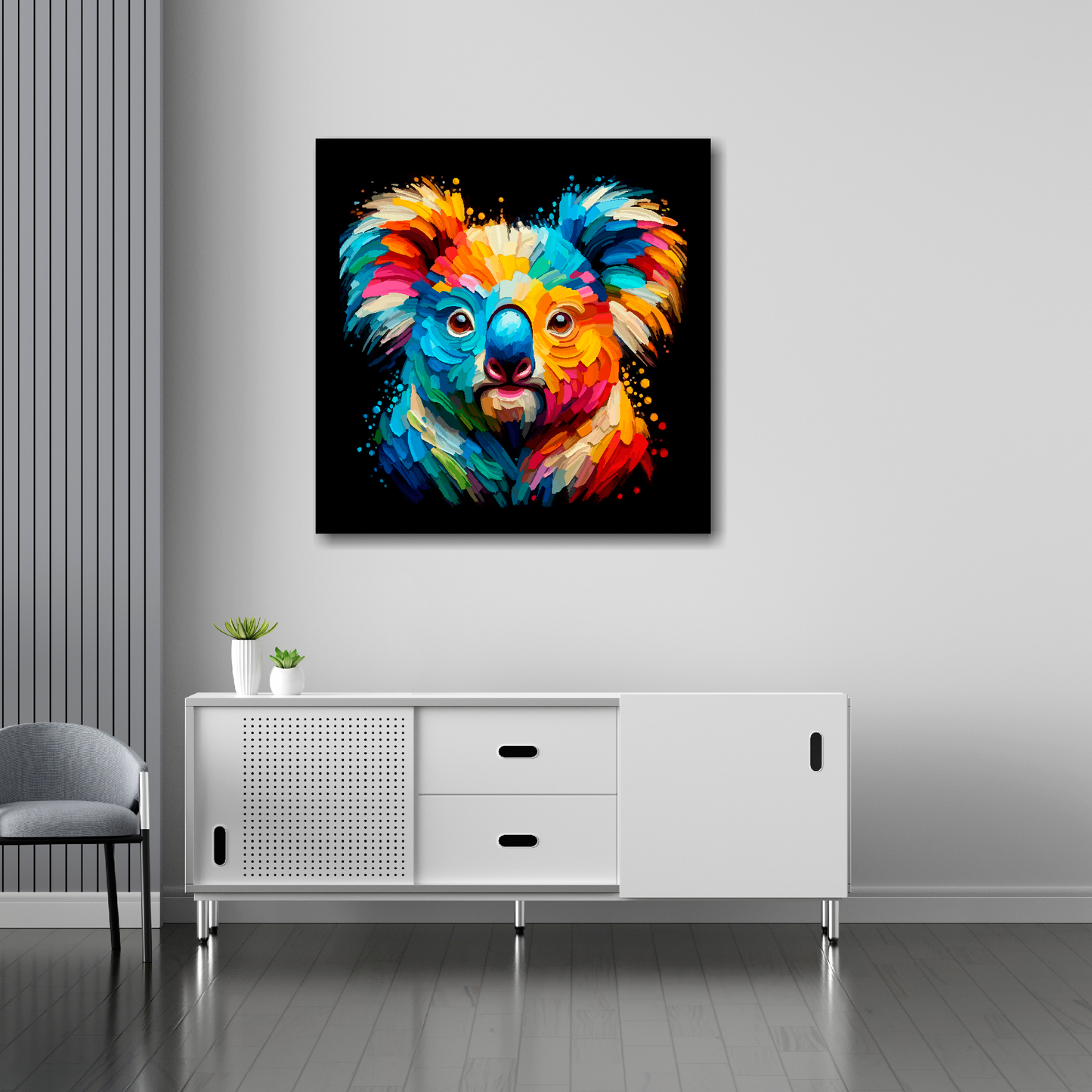 30 inch by 30 inch square canvas of a colouful Koala head portrait on a black background. Mounted on a white wall above a white sideboard.