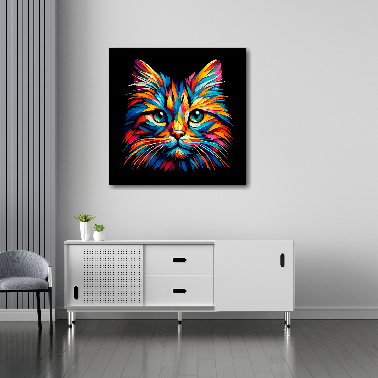 30 inch by 30 inch square canvas of a colourful Manx cat head portrait on a black background. Mounted on a white wall above a white sideboard.