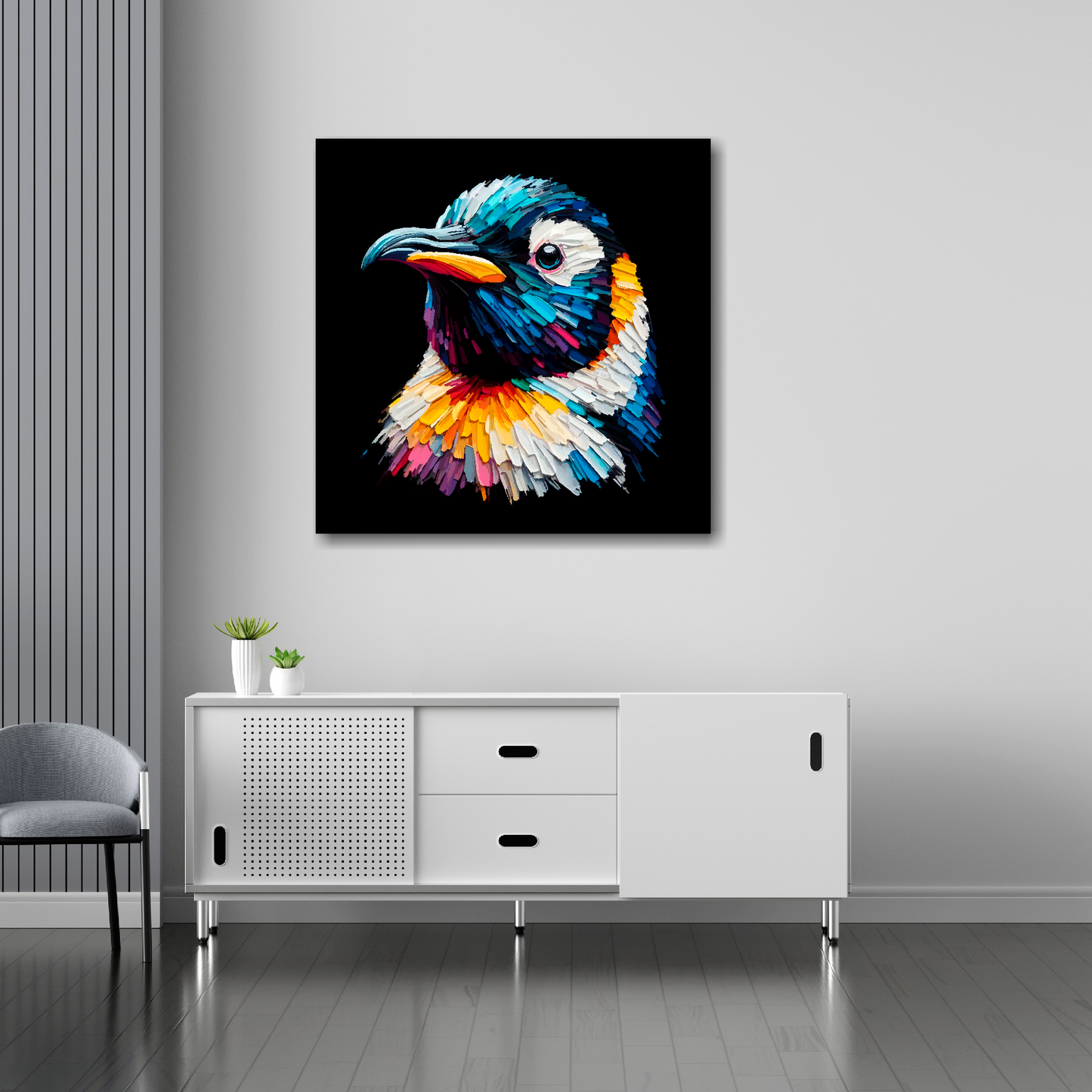 30 inch by 30 inch square canvas of a colourful Penguin portrait on a black background. Mounted on a white wall above a white sideboard.