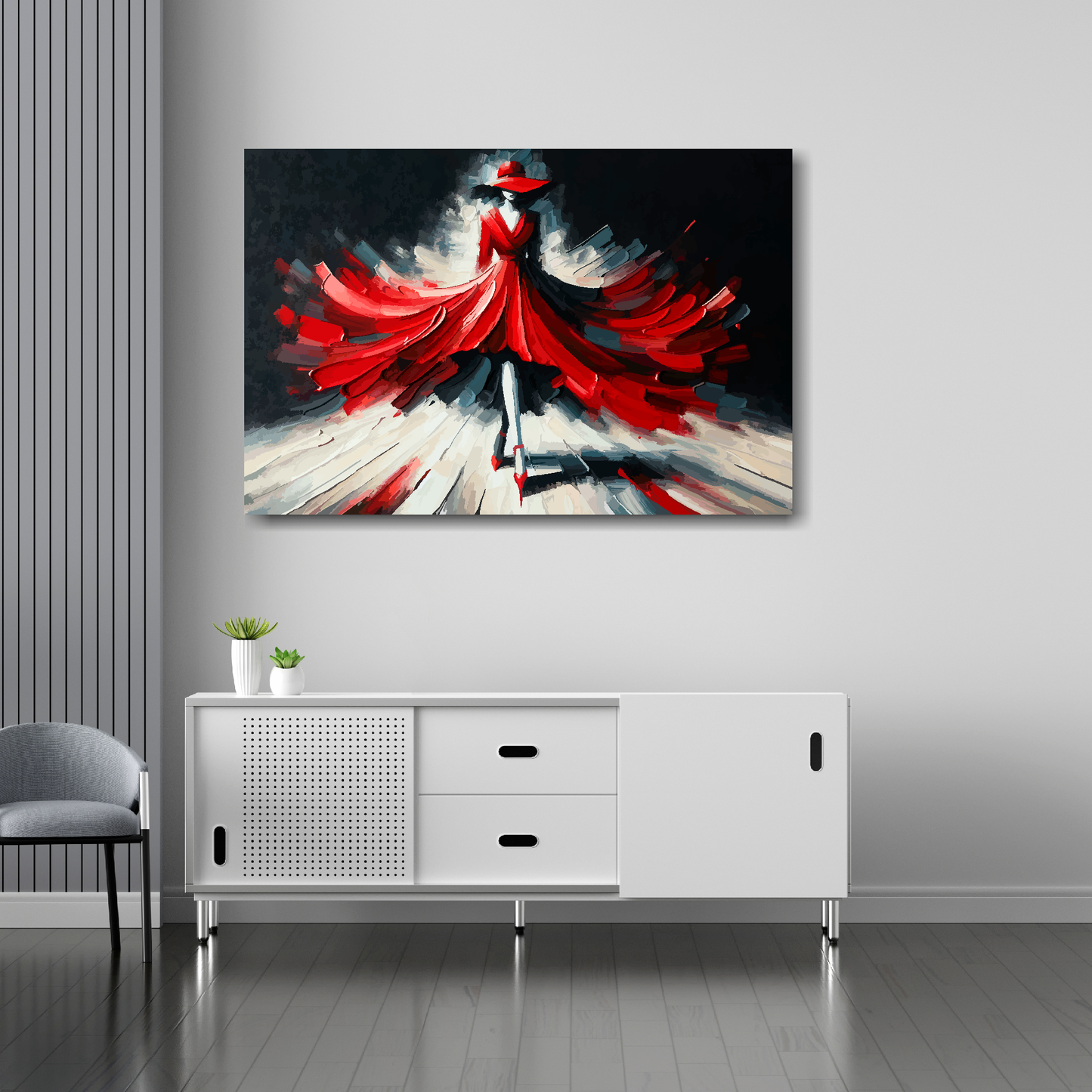 36 inch by 24 inch abstract canvas print of a woman wearing a red fashion dress. Mounted on a white wall above a white sideboard.