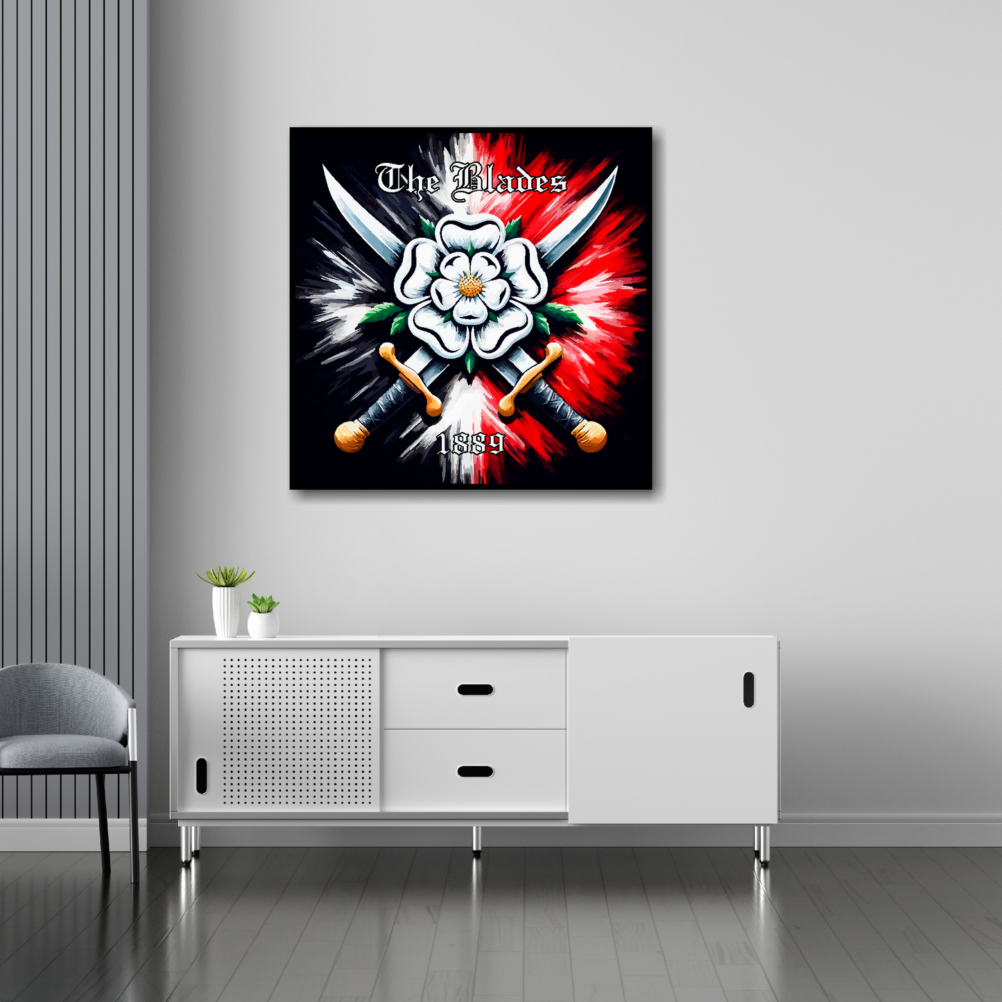 30 inch by 30 inch Sheffield United FC inspired canvas, mounted on a living room wall above a white sideboard. Featuring two crossed swords with a white Yorkshire rose on a black and red background. 'The Blades' written at the top with '1889' at the bottom.