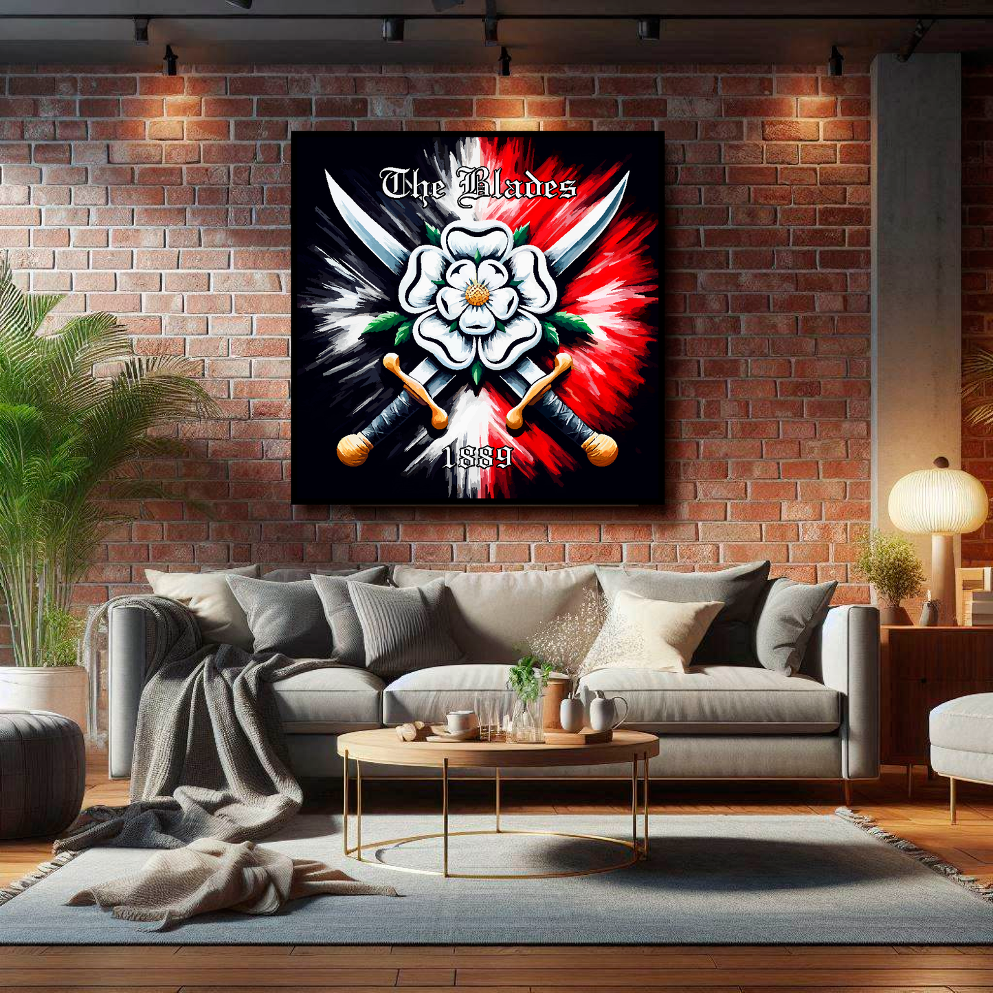 Sheffield United FC inspired canvas, mounted on a living room wall above a grey sofa. Featuring two crossed swords with a white Yorkshire rose on a black and red background. 'The Blades' written at the top with '1889' at the bottom.