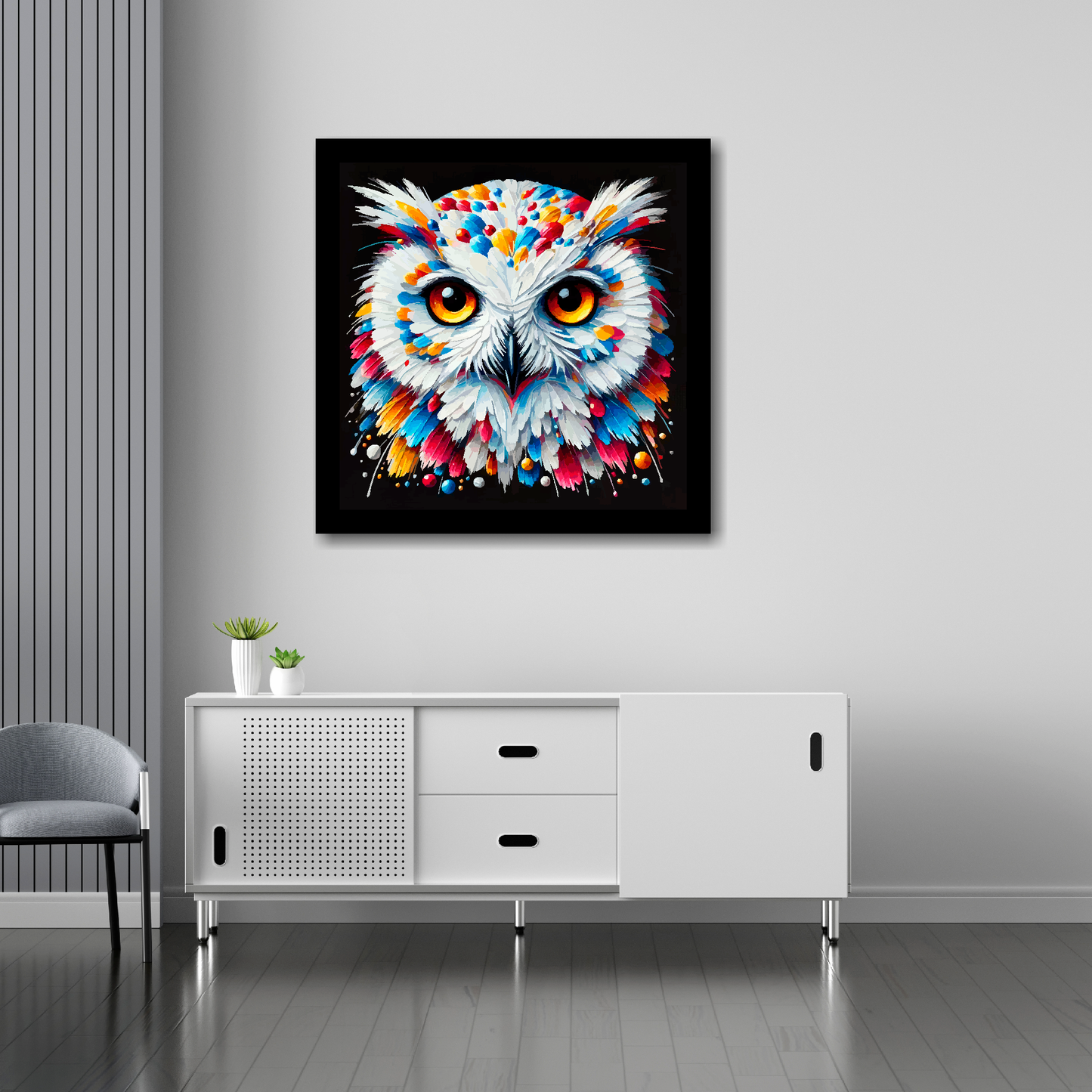 30 inch by 30 inch square canvas of a colourful Snowy Owl portrait on a black background. Mounted on a white wall above a white sideboard.