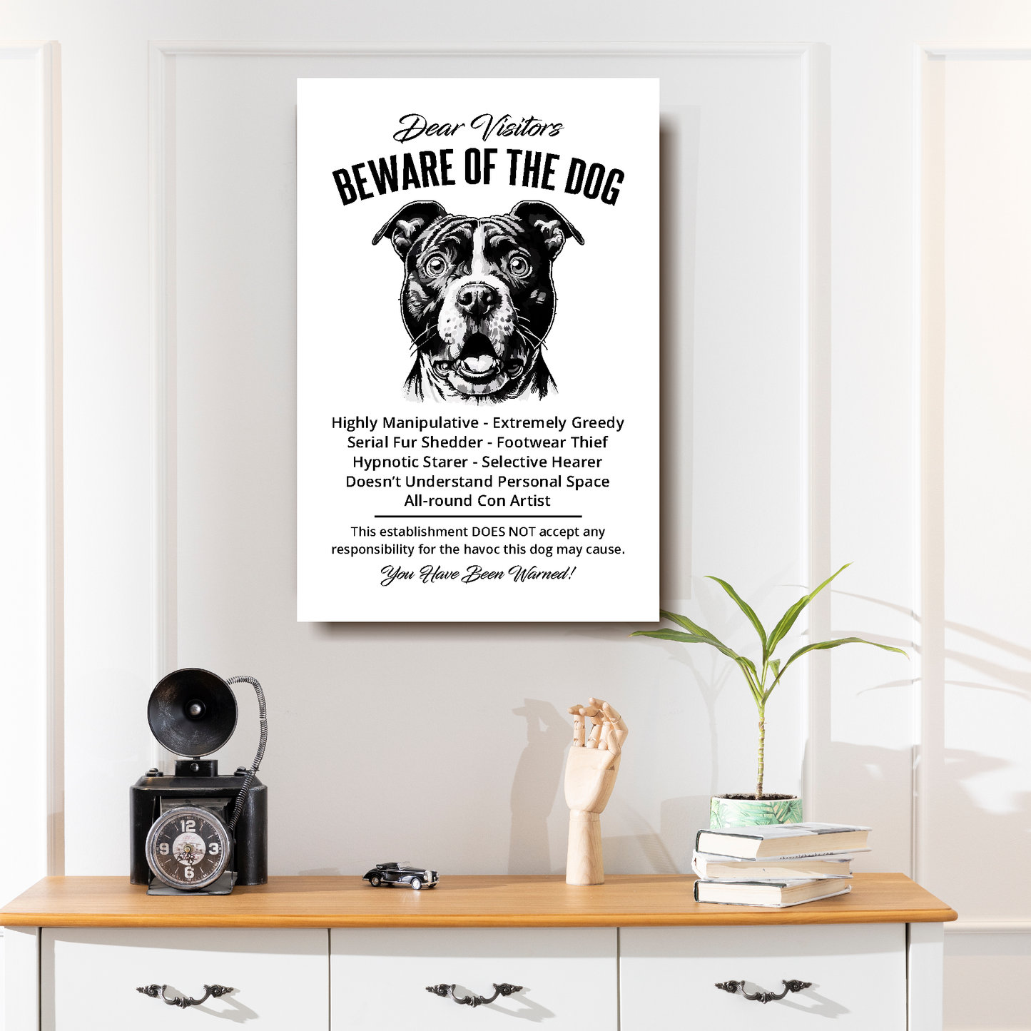 A funny Staffordshire Bull Terrier 'Beware of the Dog' disclaimer notice. Black text and dog image on a white background. Available in 4 Canvas sizes.