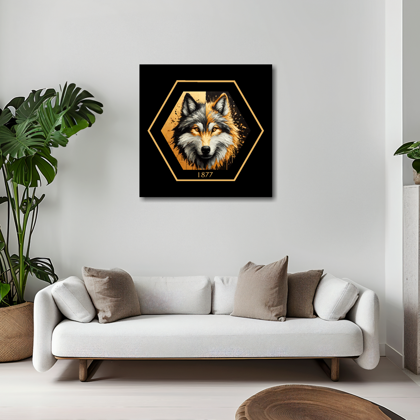 Wolverhampton Wanderers inspired canvas art. A black and gold wolf head painting sits in the middle of a hexagnal badge shape with 1877 at the bottom on a black background. Mounted on a white wall above a white sofa.
