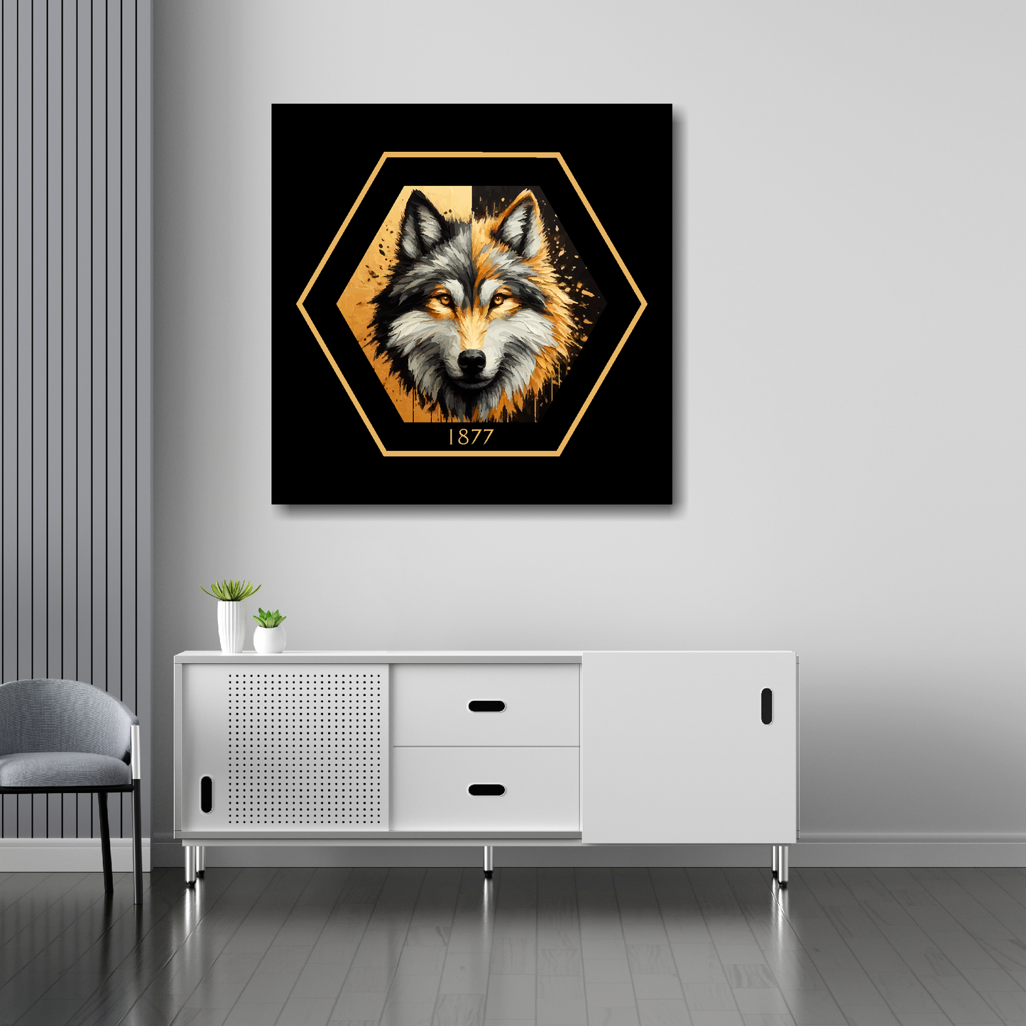 Wolverhampton Wanderers inspired canvas art. A black and gold wolf head painting sits in the middle of a hexagnal badge shape with 1877 at the bottom on a black background. Mounted on a grey wall above a w.ite sideboard.