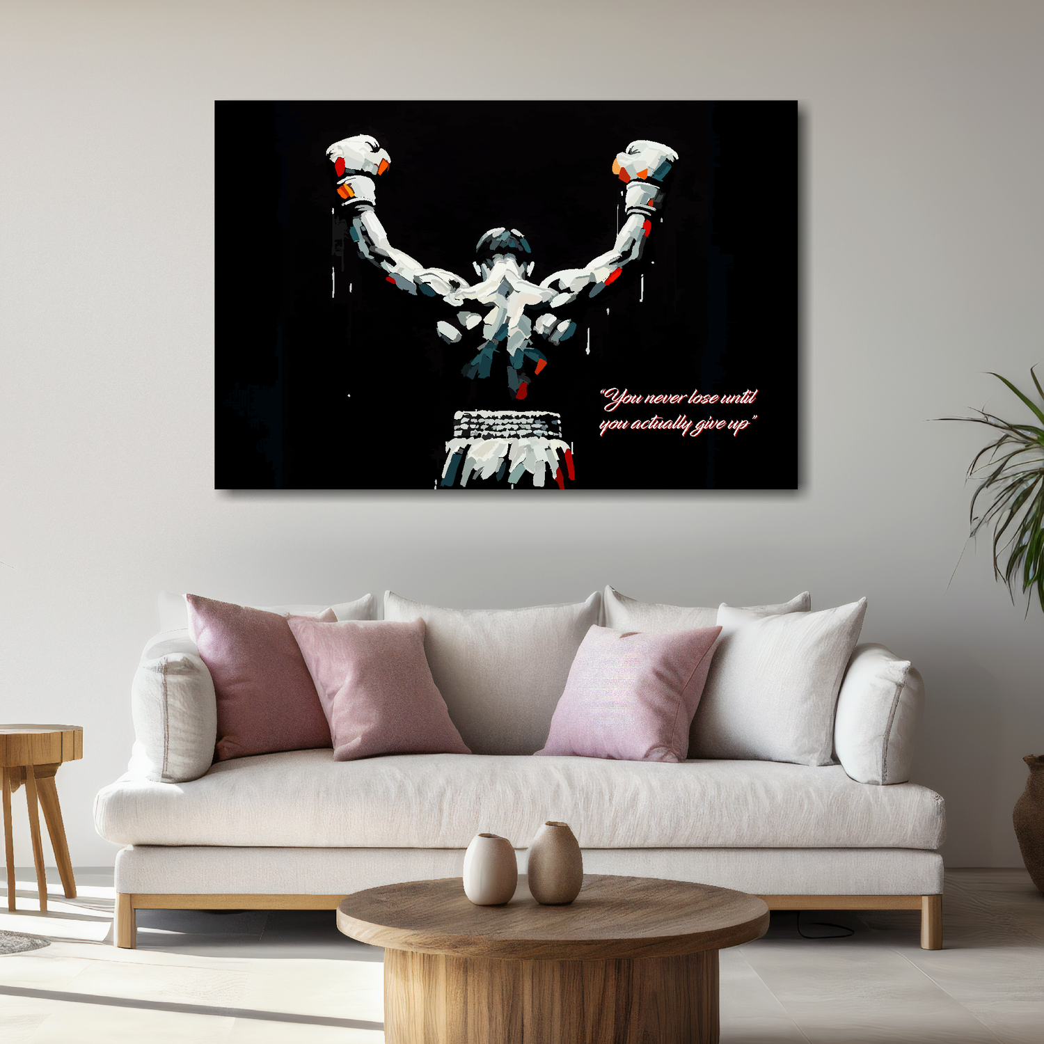 Large landscape canvas featuring a boxer with raised arms on a black background. Mounted on a white wall above a white sofa with decorative pillows.