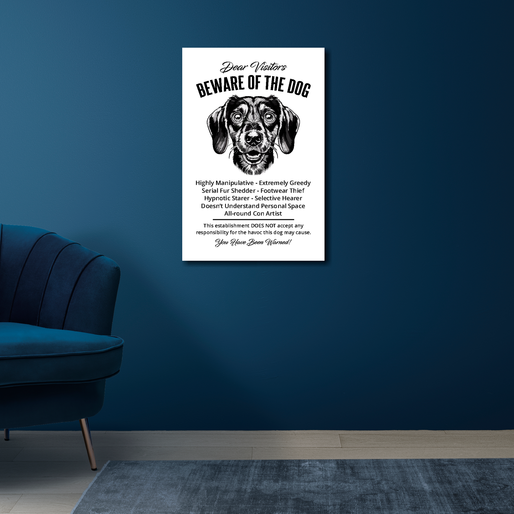 16 inch by 24 inch canvas print of a funny Dachshund 'Beware of the Dog' notice. Mounted on a blue wall above a blue chair.
