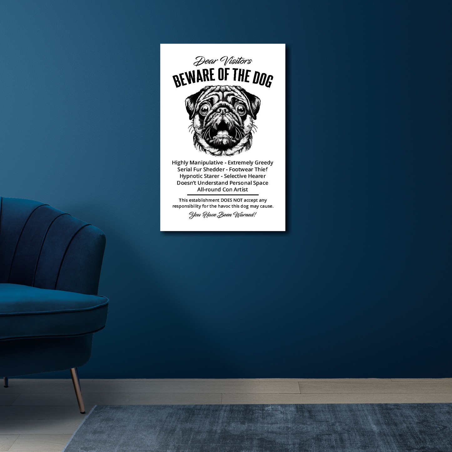 16 inch by 24 inch canvas print of a funny Pug 'Beware of the Dog' notice. Mounted on a blue wall above a blue chair.