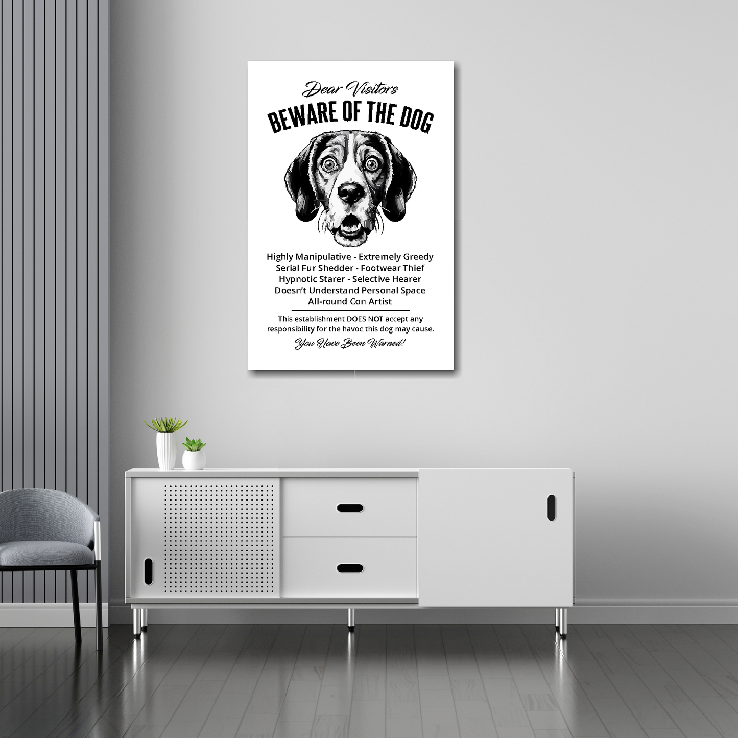 20 inch by 30 inch canvas print of a funny Beagle 'Beware of the Dog' notice. Mounted on a gray wall above a white sideboard.