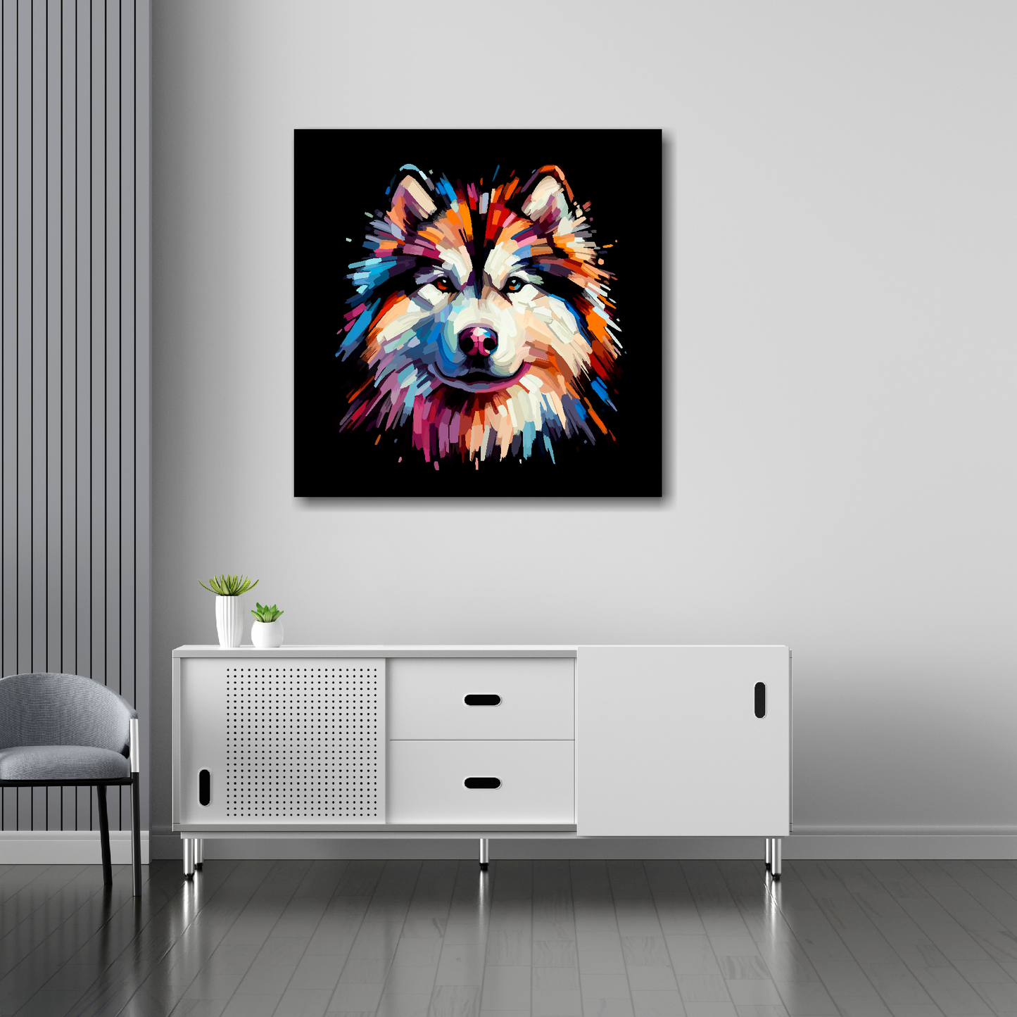 30 inch by 30 inch square canvas of a colourful Alaskan Malamute head portrait on a black background. Mounted on a white wall above a white sideboard.