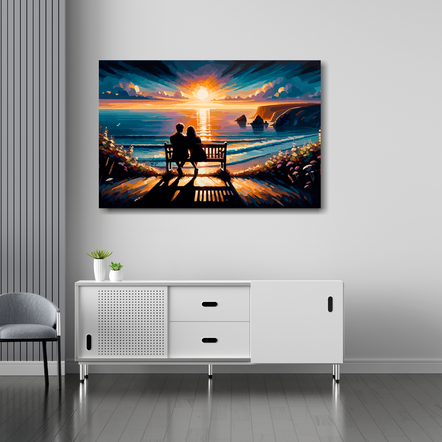 36 inch by 24 inch abstract canvas print of a couple watching a sunset. Mounted on a white wall above a white sideboard.