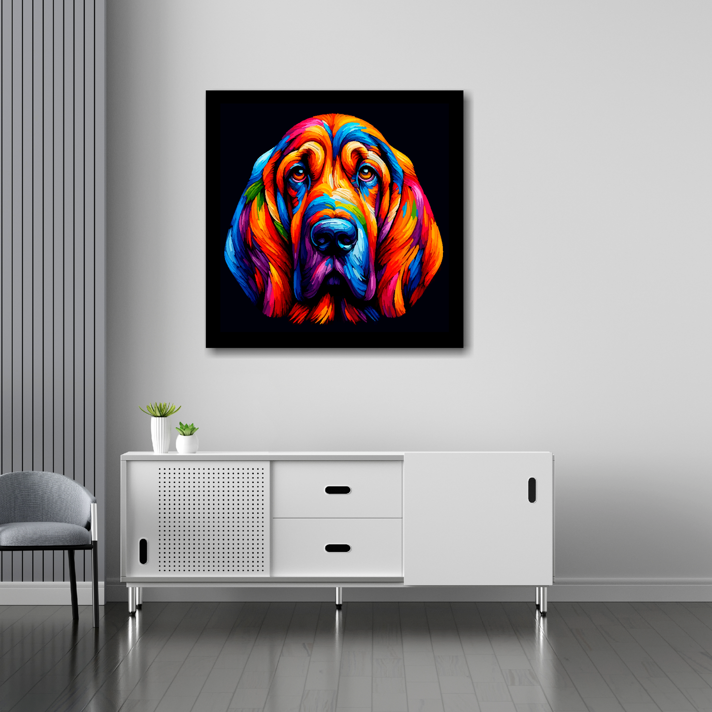 30 inch by 30 inch square canvas of a colourful Bloodhound head portrait on a black background. Mounted on a white wall above a white sideboard.