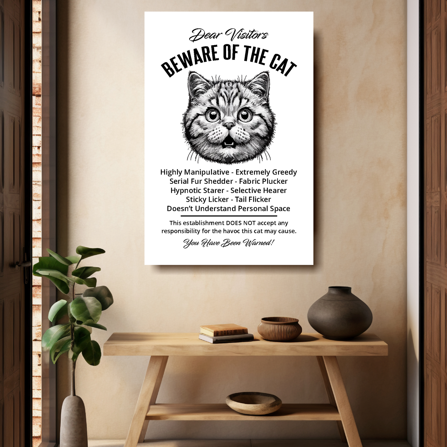 A funny British Shorthair 'Beware of the Cat' disclaimer notice. Black text and dog image on a white background. Available in 4 Canvas sizes. A great gift for cat owners.
