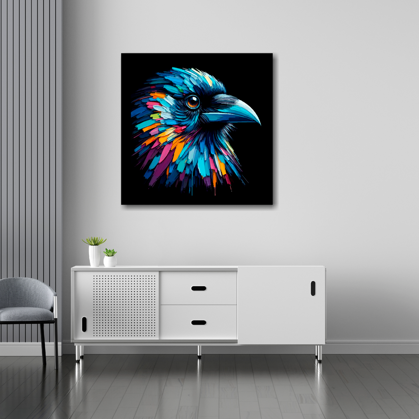 30 inch by 30 inch square canvas of a colourful Crow portrait on a black background. Mounted on a white wall above a white sideboard.