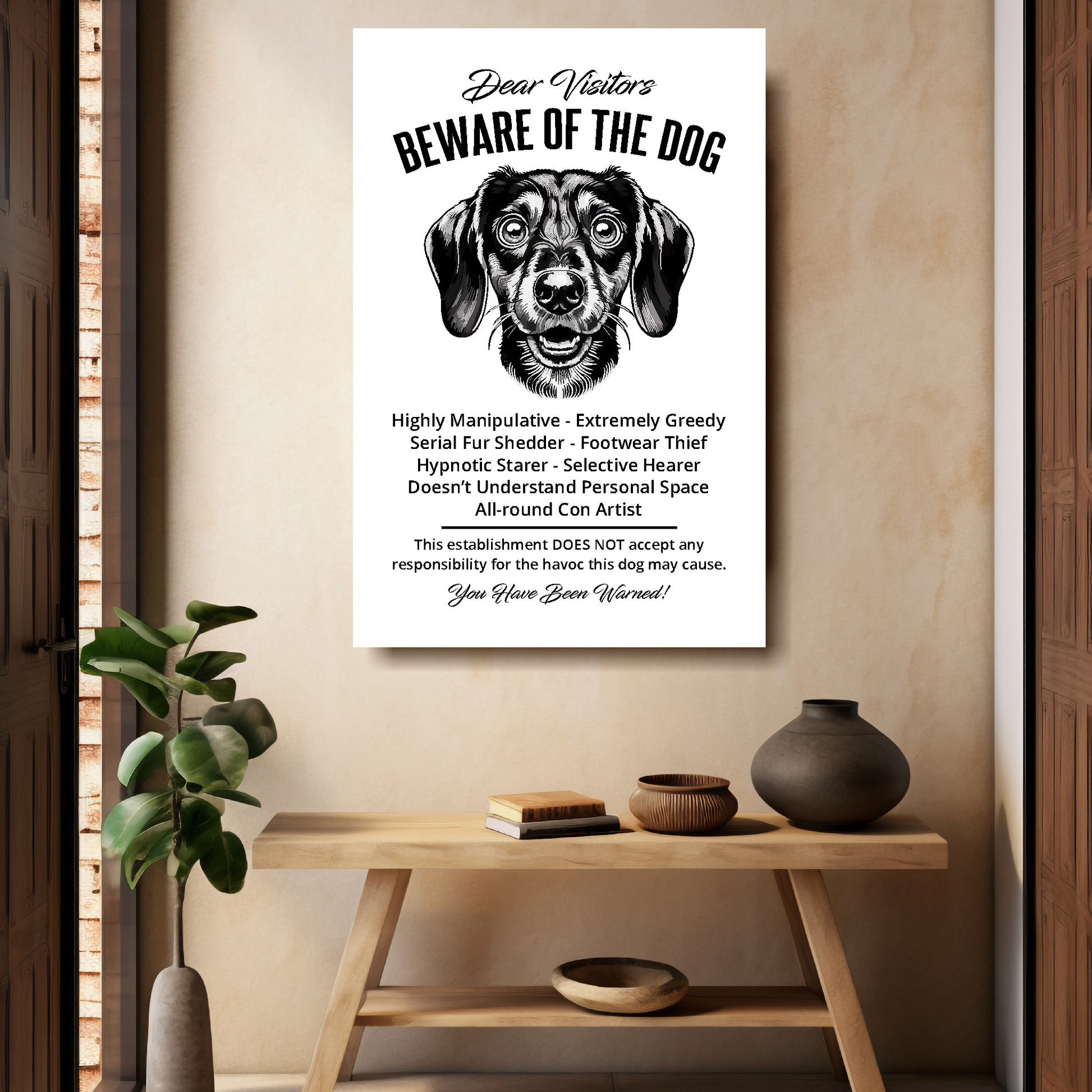 A funny Dachshund 'Beware of the Dog' disclaimer notice. Black text and dog image on a white background. Available in 4 Canvas sizes. A great gift for dog owners.
