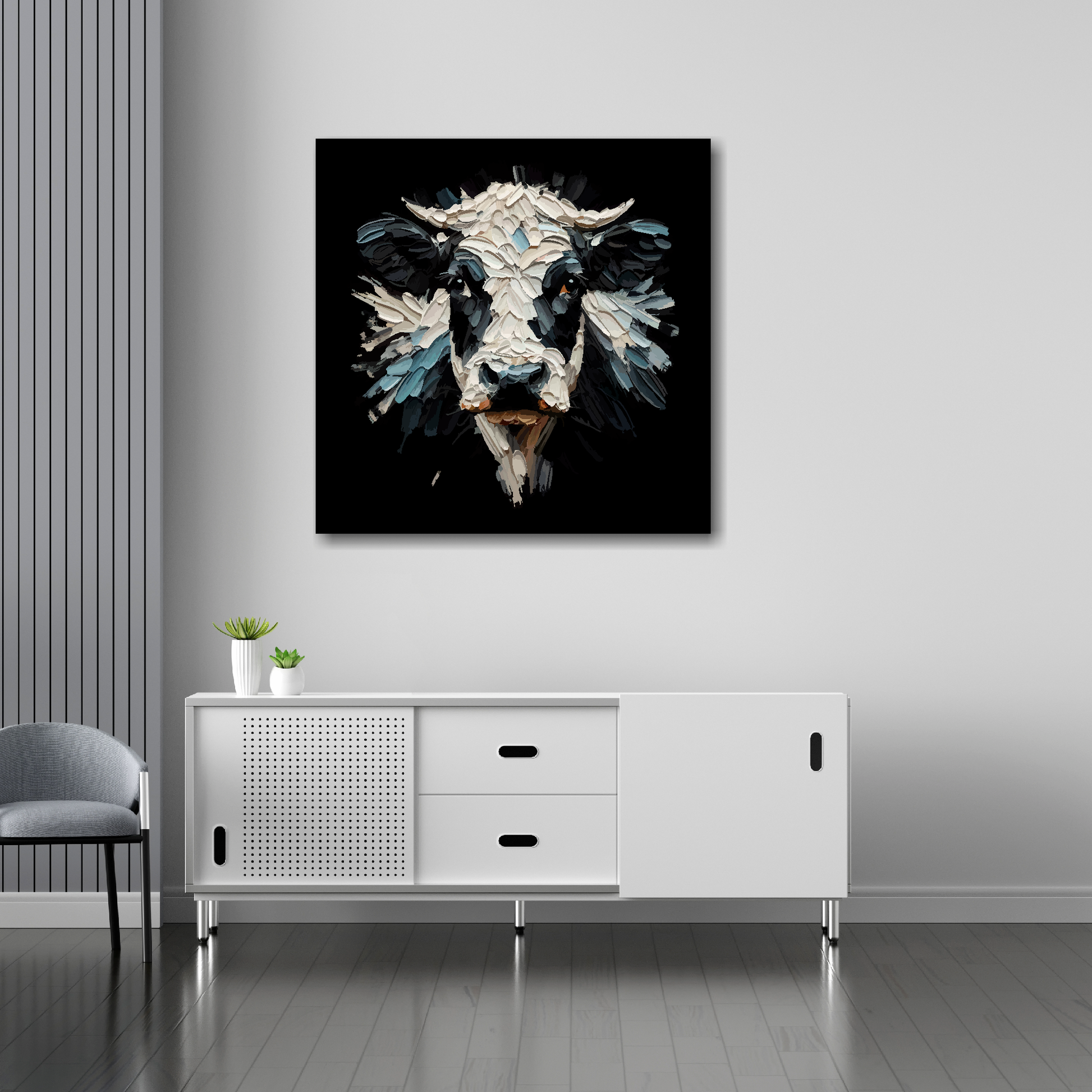 30 inch by 30 inch square canvas of a Dairy Cow head portrait on a black background. Mounted on a white wall above a white sideboard.