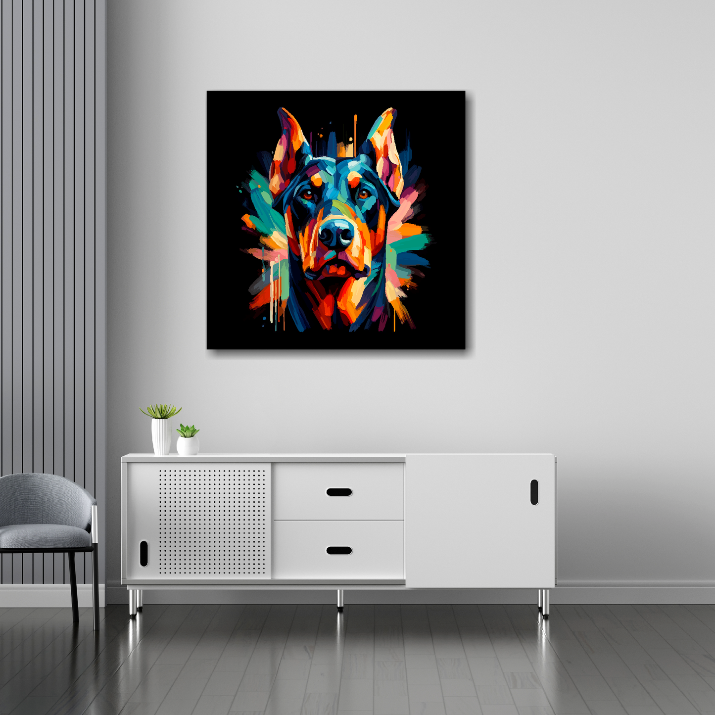 30 inch by 30 inch square canvas of a colourful Doberman Pinscher Dog head portrait on a black background. Mounted on a white wall above a white sideboard.