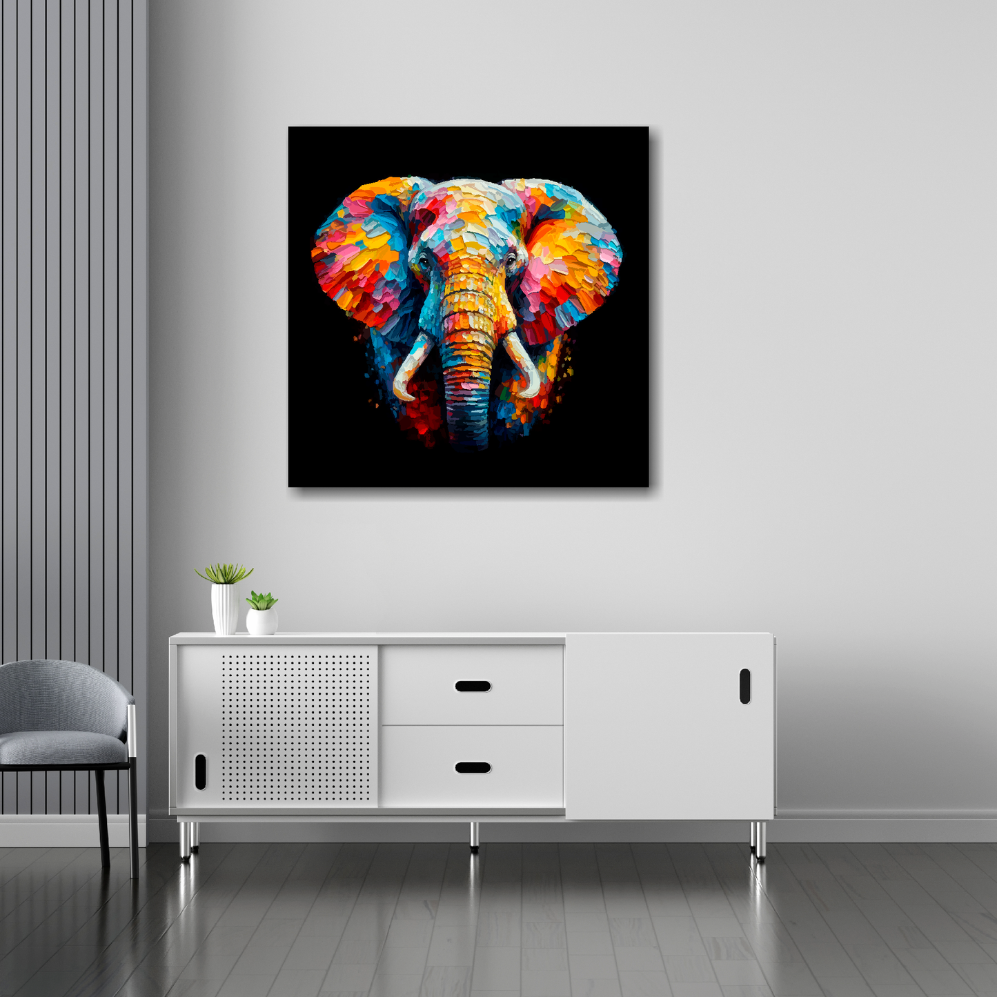 30 inch by 30 inch square canvas of a colouful Elephant on a black background. Mounted on a white wall above a white sideboard.