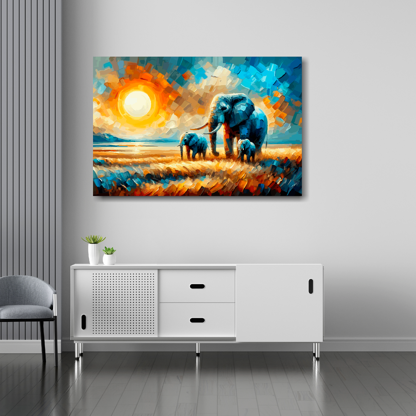 36 inch by 24 inch abstract canvas print of an African Plains landscape featuring 3 Elephants. Mounted on a white wall above a white sideboard.