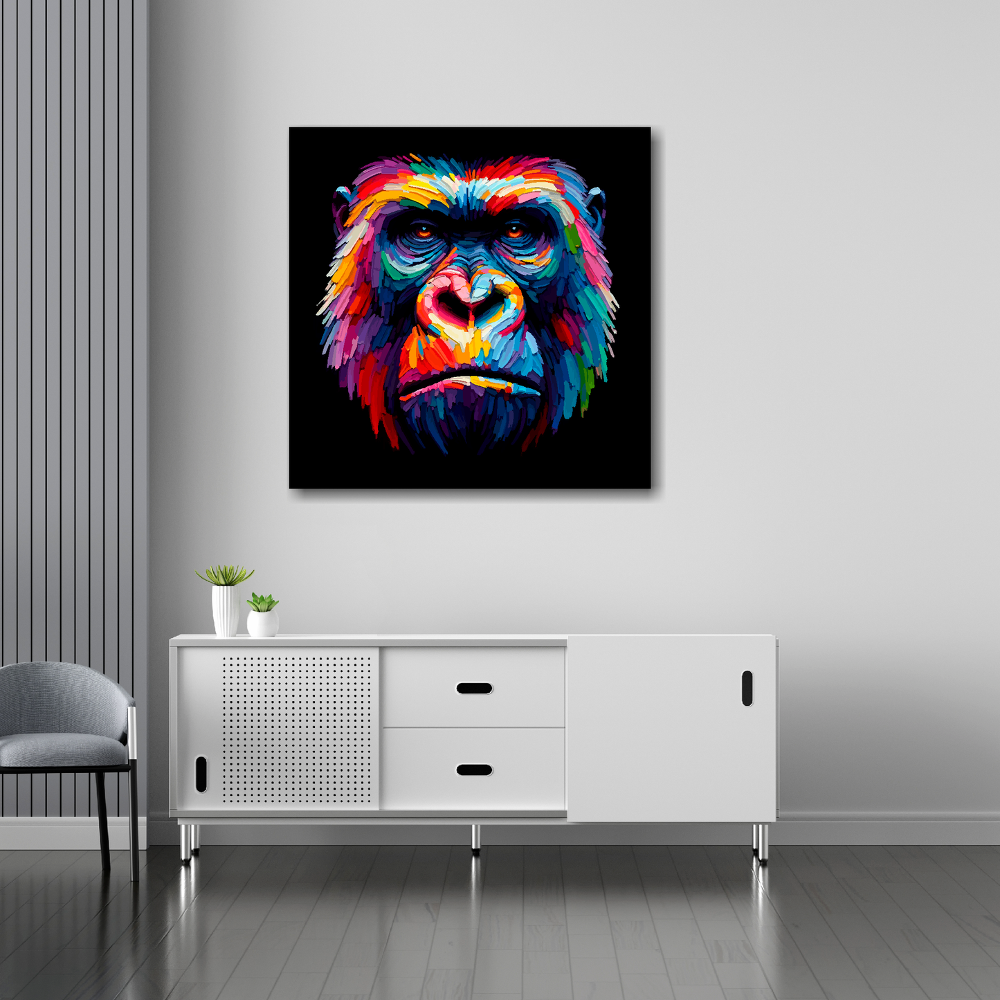 30 inch by 30 inch square canvas of a colouful Gorilla head Portrait on a black background. Mounted on a white wall above a white sideboard.