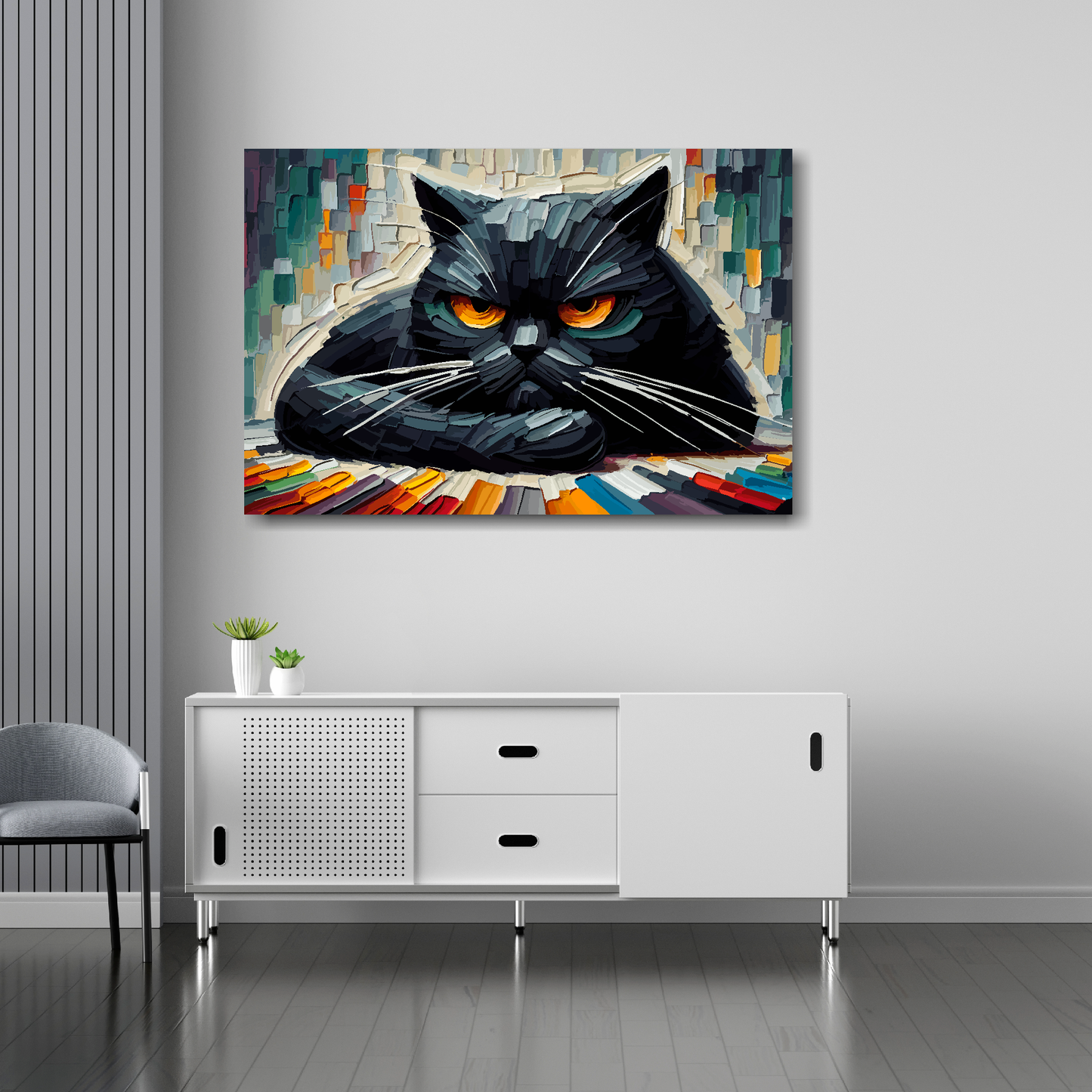 36 inch by 24 inch abstract canvas print of a grumpy black cat. Mounted on a white wall above a white sideboard.