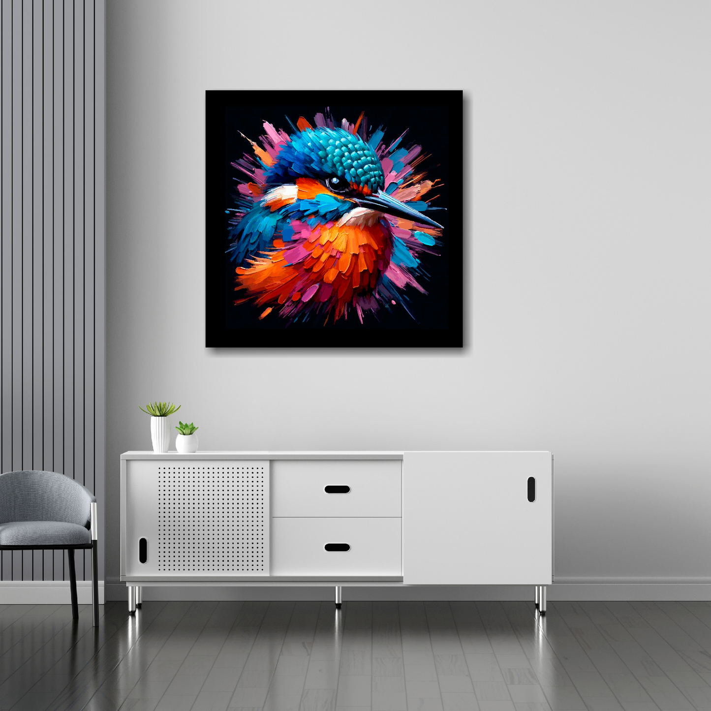 30 inch by 30 inch square canvas of a colourful Kingfisher portrait on a black background. Mounted on a white wall above a white sideboard.
