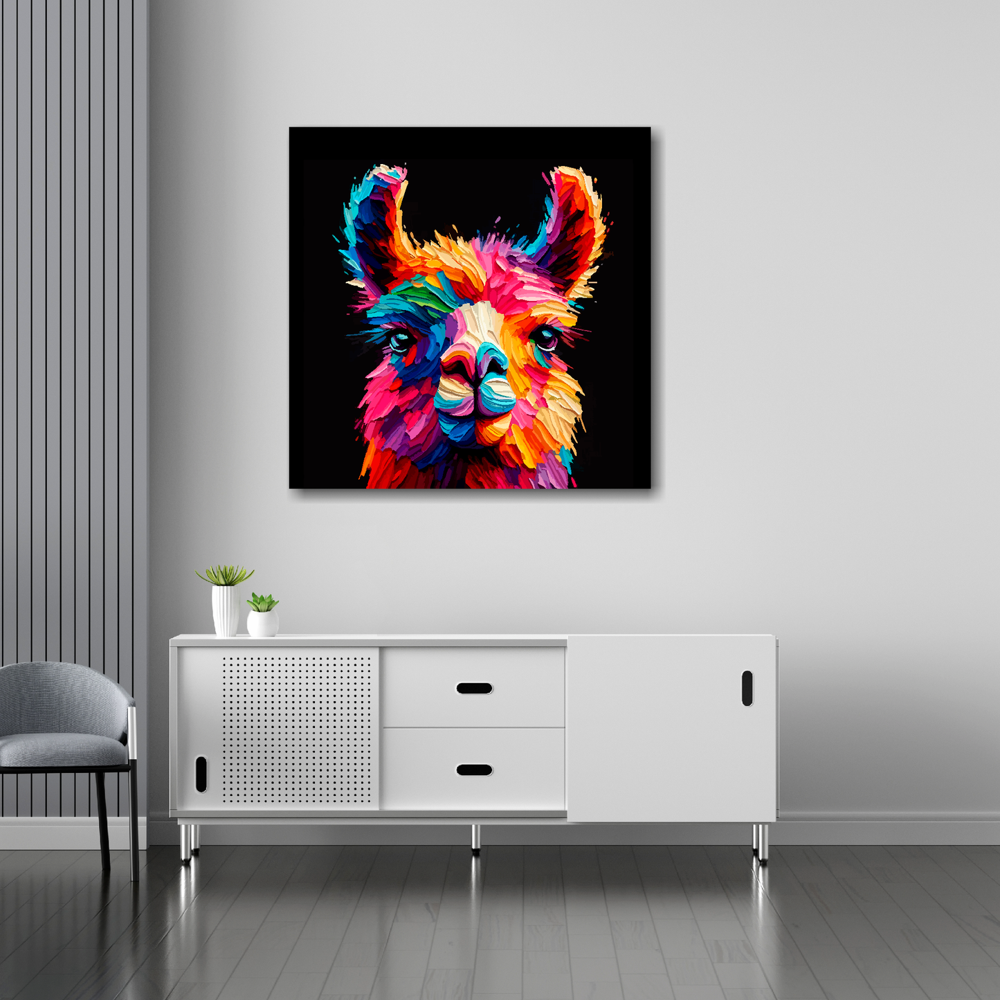 30 inch by 30 inch square canvas of a colouful Llama head portrait on a black background. Mounted on a white wall above a white sideboard.