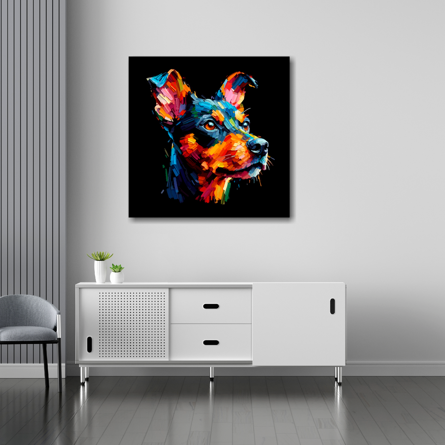 30 inch by 30 inch square canvas of a colourful Manchester Terrier head portrait on a black background. Mounted on a white wall above a white sideboard.
