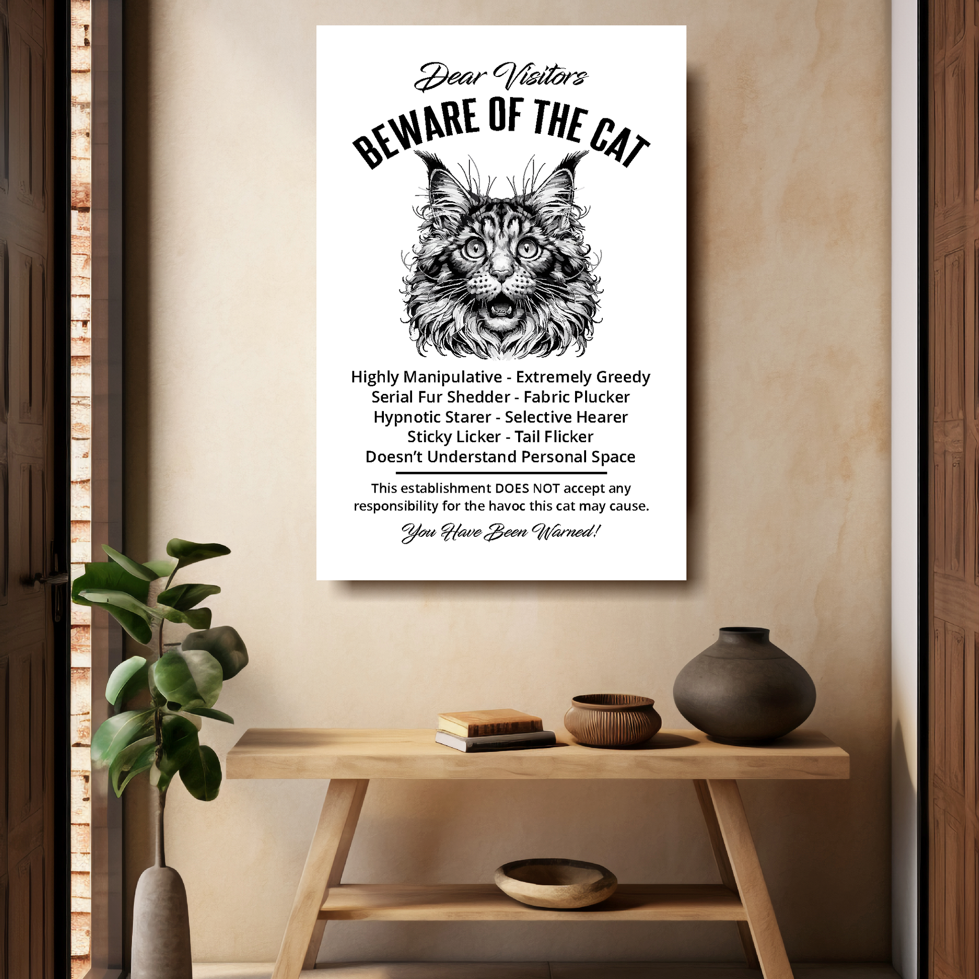 A funny Maine Coon 'Beware of the Cat' disclaimer notice. Black text and dog image on a white background. Available in 4 Canvas sizes. A great gift for cat owners.