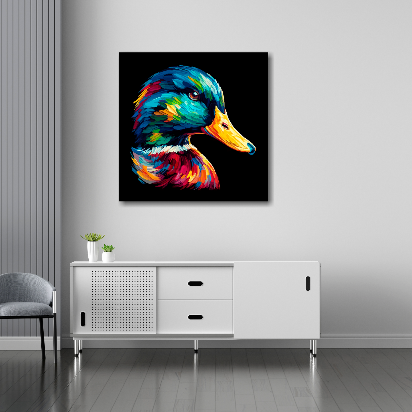 30 inch by 30 inch square canvas of a colourful Mallard Duck portrait on a black background. Mounted on a white wall above a white sideboard.