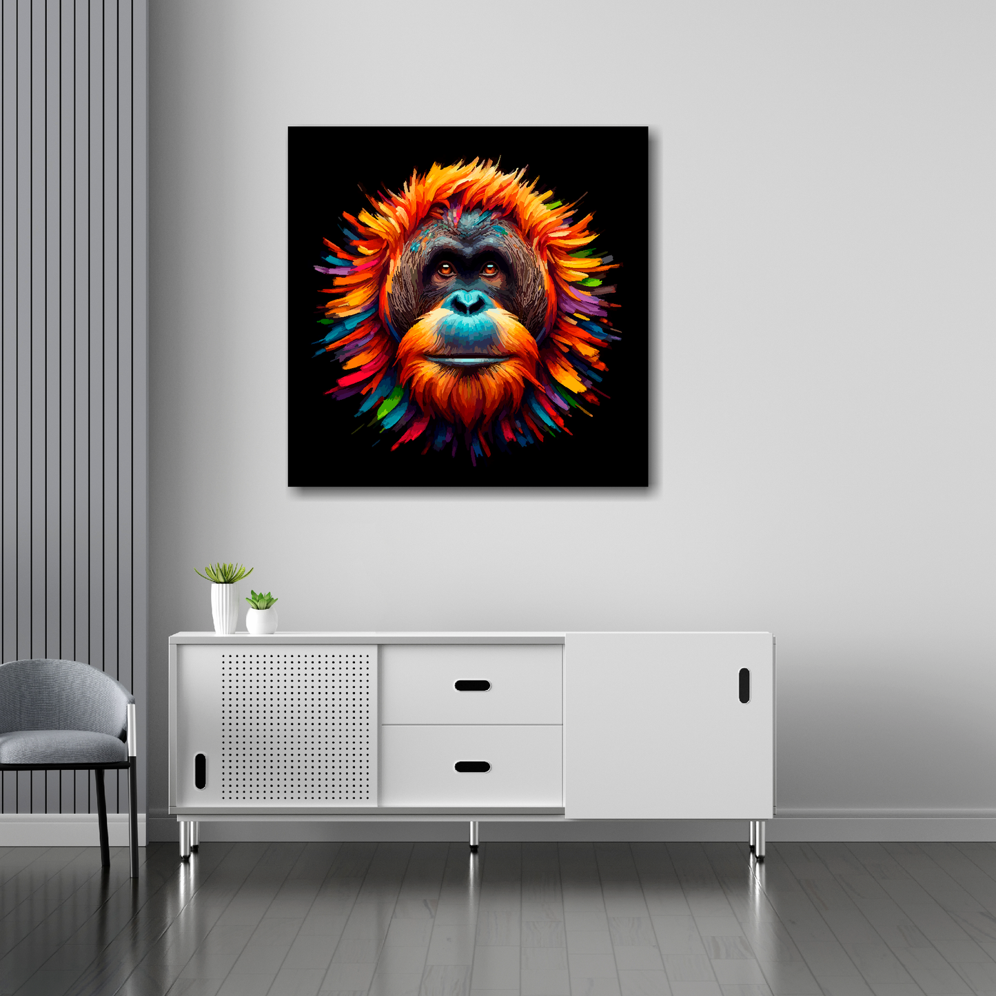 30 inch by 30 inch square canvas of a colouful Orangutan head portrait on a black background. Mounted on a white wall above a white sideboard.