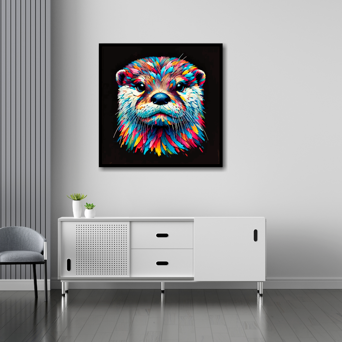 30 inch by 30 inch square canvas of a colouful Otter head portrait on a black background. Mounted on a white wall above a white sideboard.