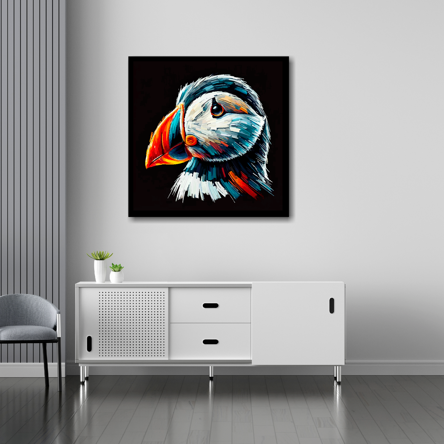 30 inch by 30 inch square canvas of a colourful Puffin portrait on a black background. Mounted on a white wall above a white sideboard.