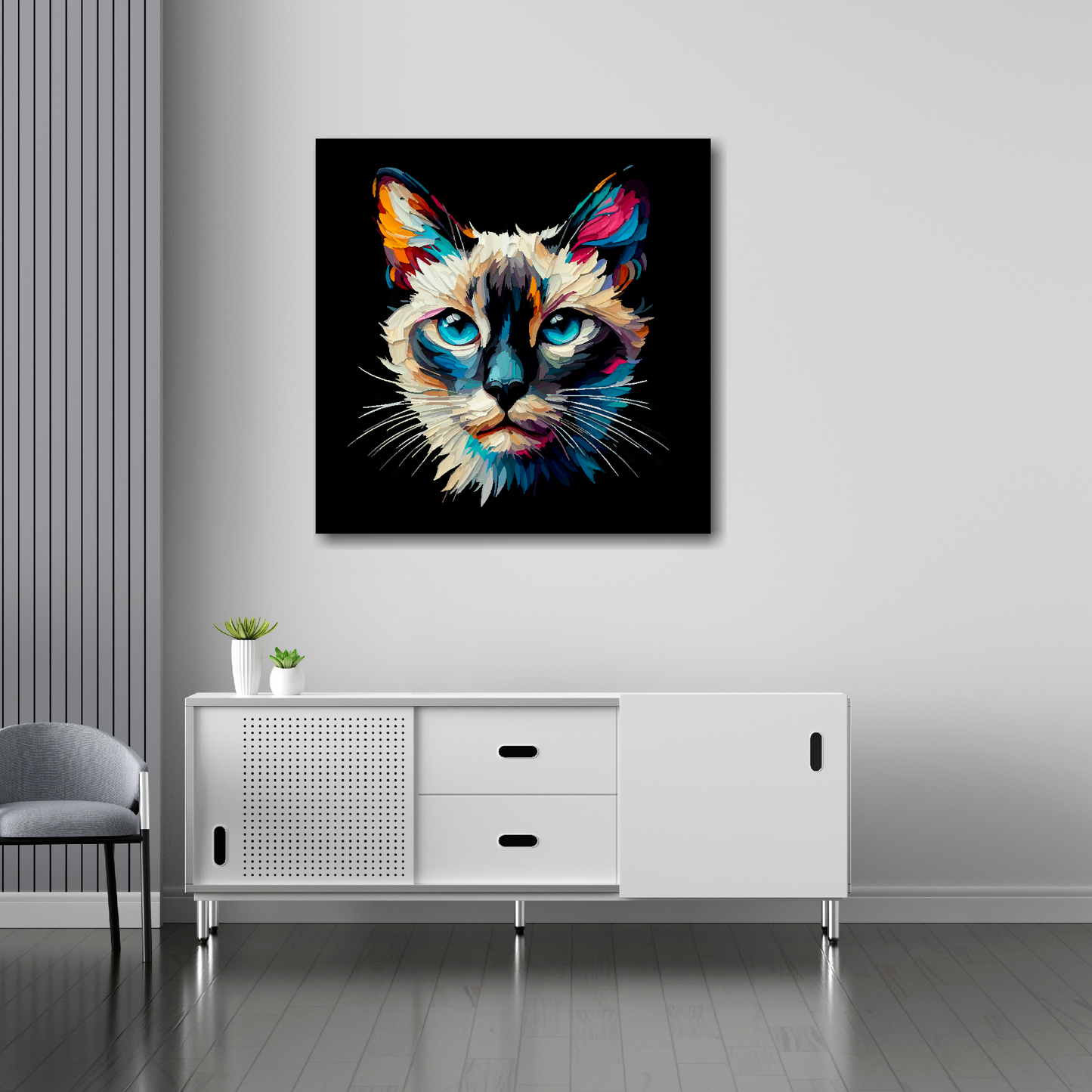30 inch by 30 inch square canvas of a colourful Siamese cat head portrait on a black background. Mounted on a white wall above a white sideboard.