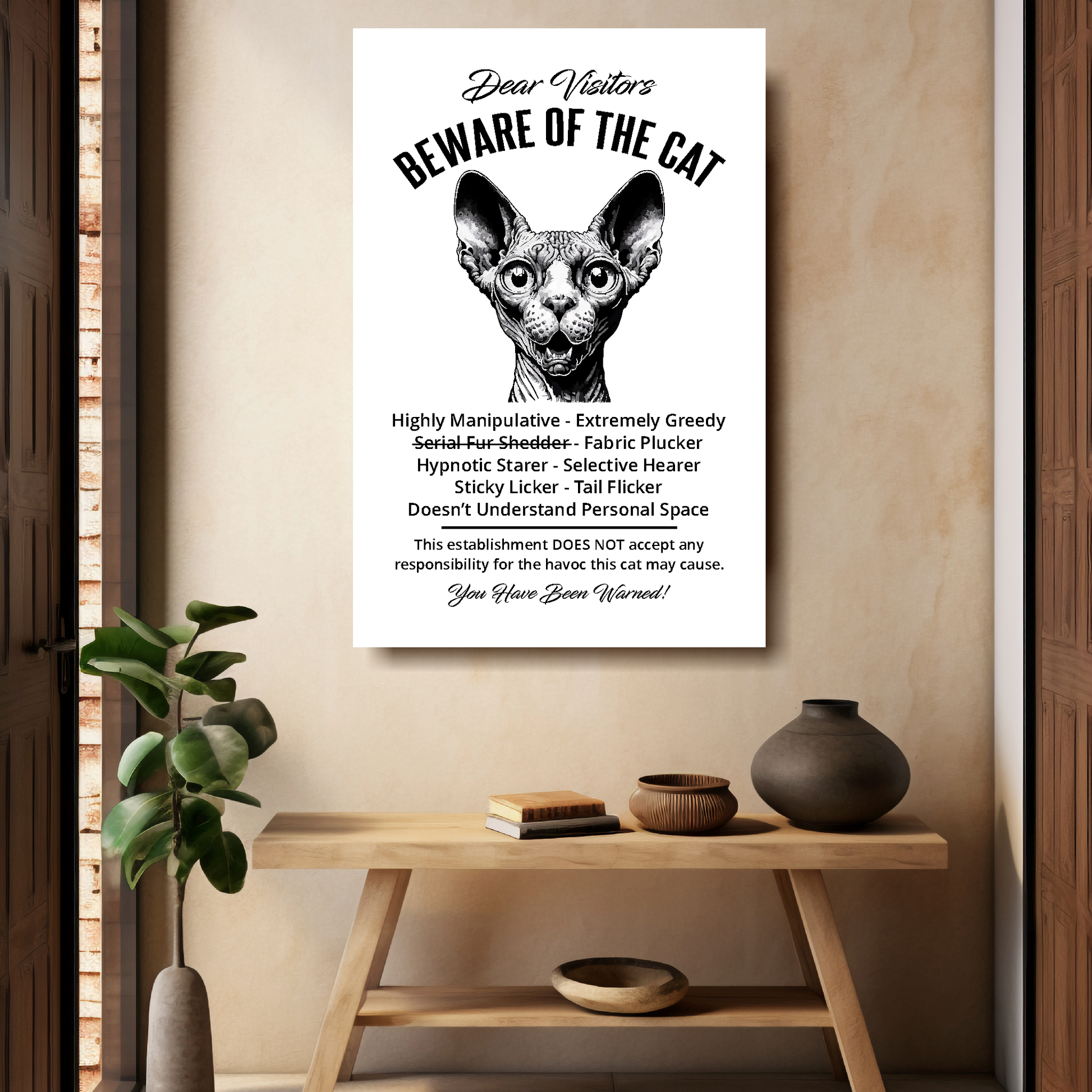 A funny Sphynx 'Beware of the Cat' disclaimer notice. Black text and dog image on a white background. Available in 4 Canvas sizes. A great gift for cat owners.